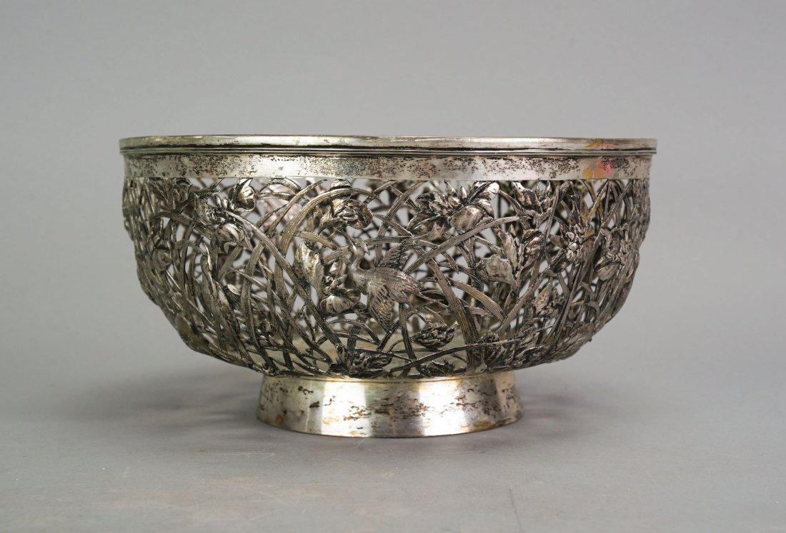 Antique 19thC Chinese Export Silver Open-Work Heron Footed Bowl: Ca. 2nd to 3rd quarter 19thC. Very good original condition with no breaks, cracks, splits or repairs. Needs polishing. There are ten herons in various poses surrounded by tall grass, flowers and leave