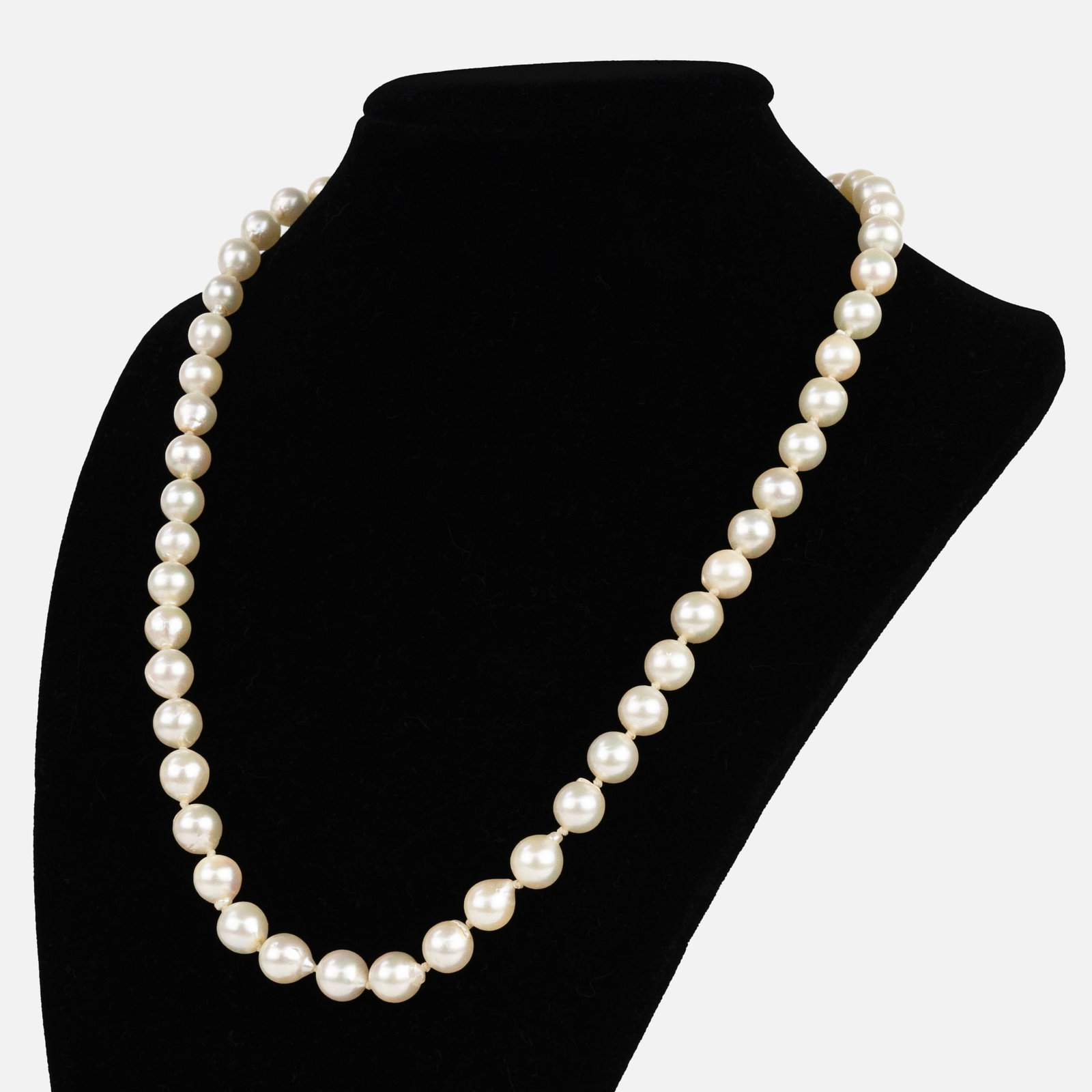 Freshwater Pearl 18 1/2" Necklace w/18K White Gold Three-Stone Diamond Clasp: Cultured freshwater pearl necklace with 18k white gold three-stone diamond clasp. Measuring approx. 18 1/2" long, with pearls measuring on average approx 7.75mm. Center diamond measures approx. 3.6mm.