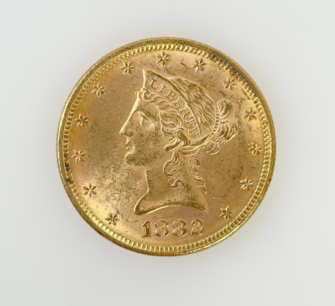 US 1882 Liberty Head Gold $10 16.718g .900 Gold: Struck in 16.718g of .900 gold for an AGW of 15.0462g. All shipping will be through USPS Registered Mail, we do not combine shipping.