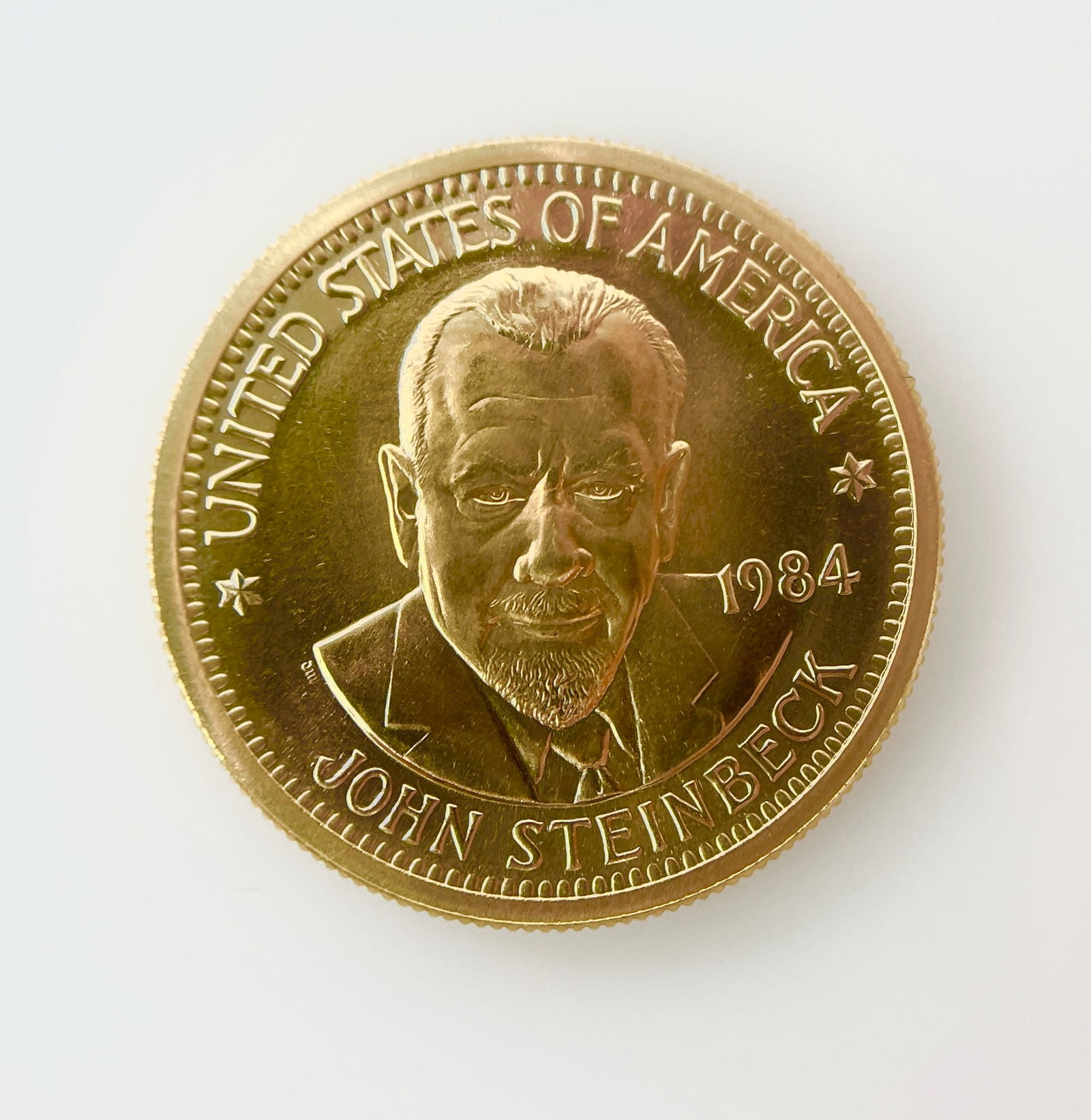 US 1984 John Steinbeck American Arts Commemorative 1/2 Troy Oz. Gold Bullion Round (1 of 4)