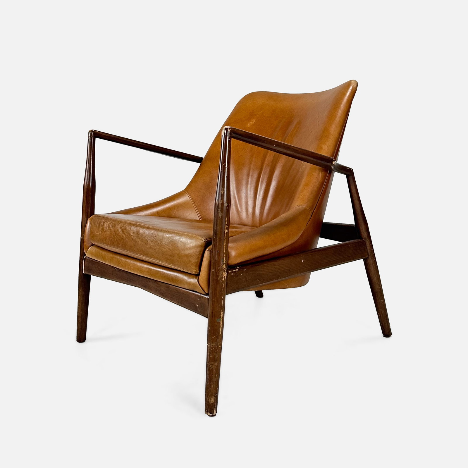 Ib Kofod-Larsen Style Lounge Chair: Lounge chair with brown upholstery in the style of Ib Kofod-Larsen's Easy Chair. Condition as shown in photos, with scuffs, scratches, upholstery wear.