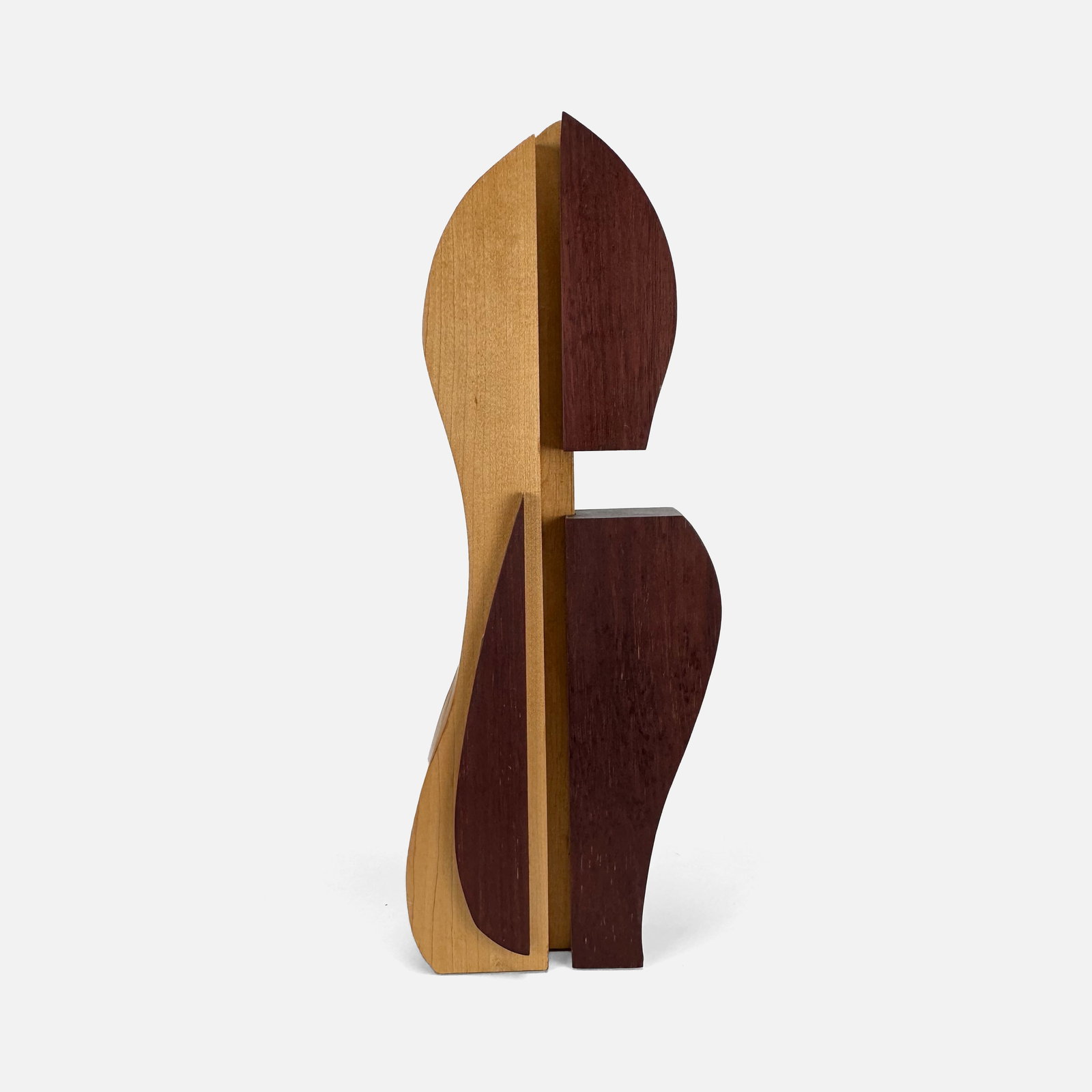 Bruce Miller Modernist Penguin Wood Sculpture: Contemporary modernist wood sculpture in a stylized form of a penguin. Very good, with age-appropriate wear.