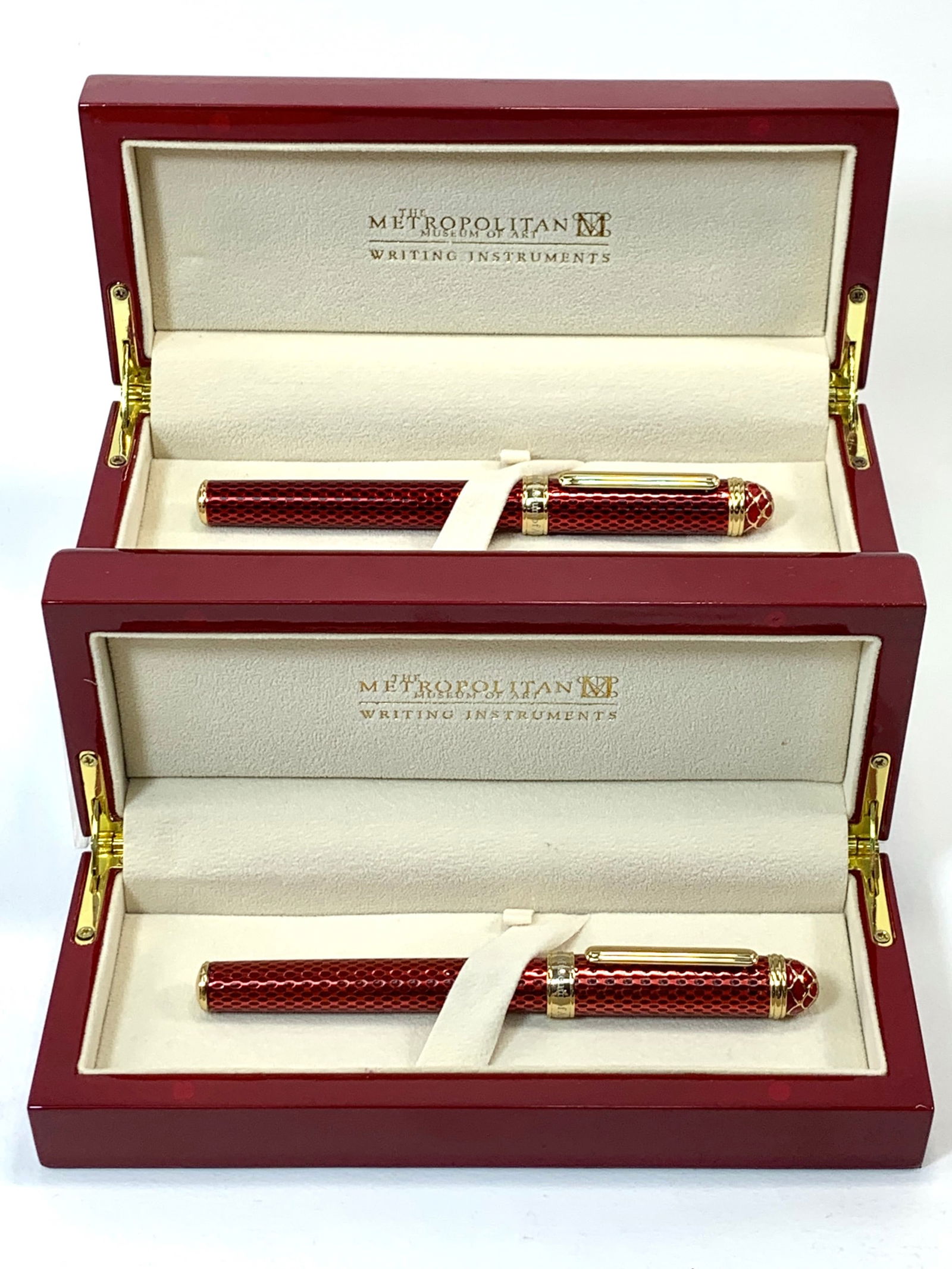 MET Germany Red Enamel Fountain and Ballpoint Pen w/Two Wood Lacquer Boxes: Excellent unused condition, both, with no defects. The enamel work is very fine, similar to guilloche enamel jewelry, especially on the caps. Approx. L: 5 5/8". Well built, high quality pens with high