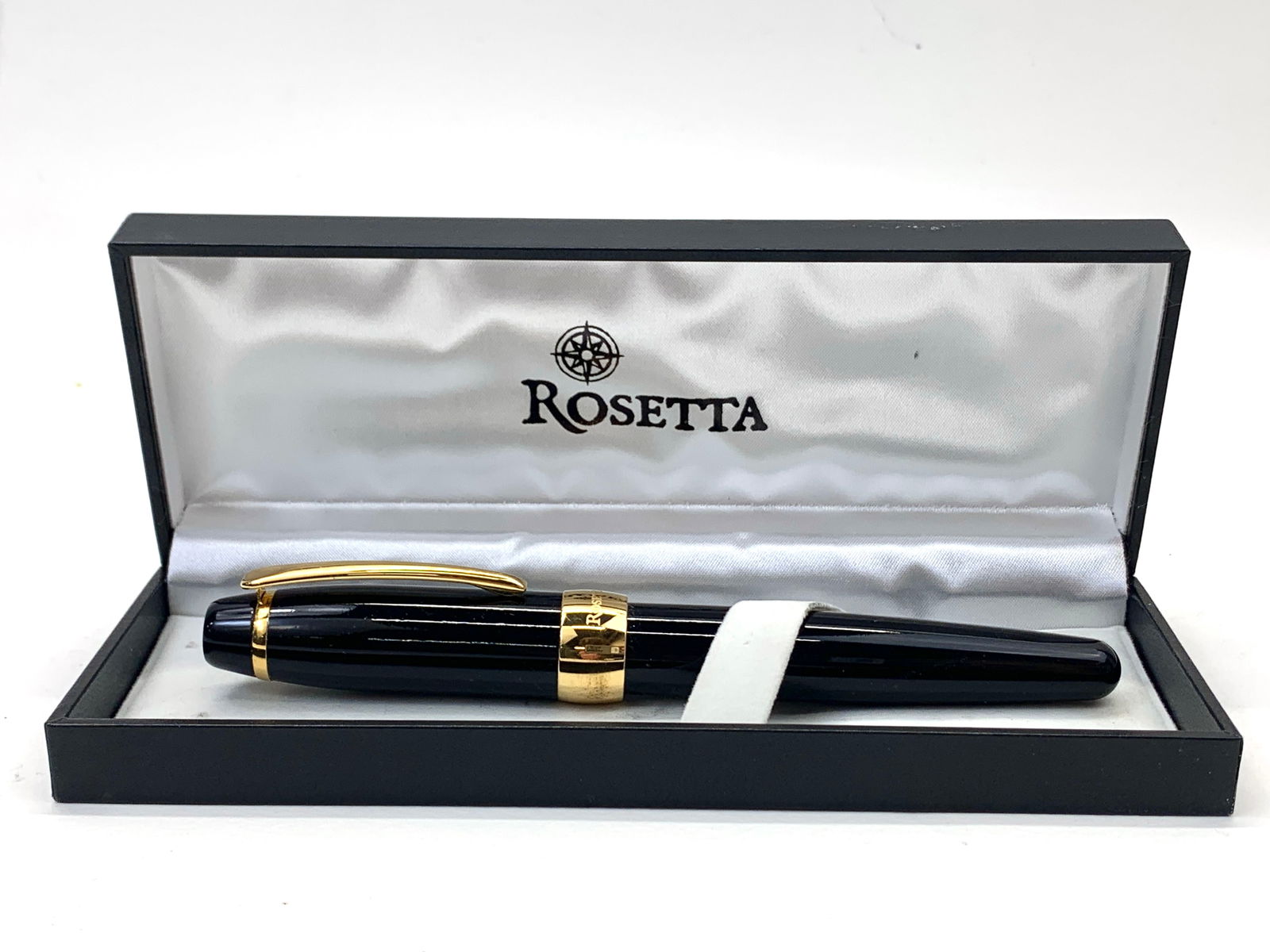 Rosetta Germany Fat Oversized Black and Gold Fountain Pen w/Box: Shipping: We do not provide in-house shipping or packing. Please reach out to one of our preferred shippers for a quote: Donald Camden UPS Store #4608 store4608@theupsstore.com - 703-569-8802 Navis Pa