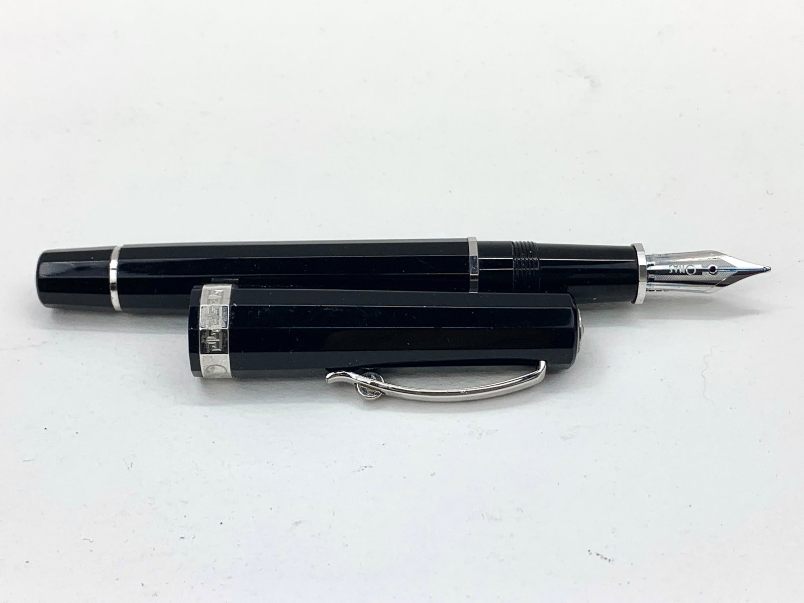 Omas Italy Octagonal Black Roller Clip Ballpoint Pen No Box: Good lightly used condition, with no defects. Approx. 5 3/4". Glossy finish throughout. Shipping: We do not provide in-house shipping or packing. Please reach out to one of our preferred shippers for 