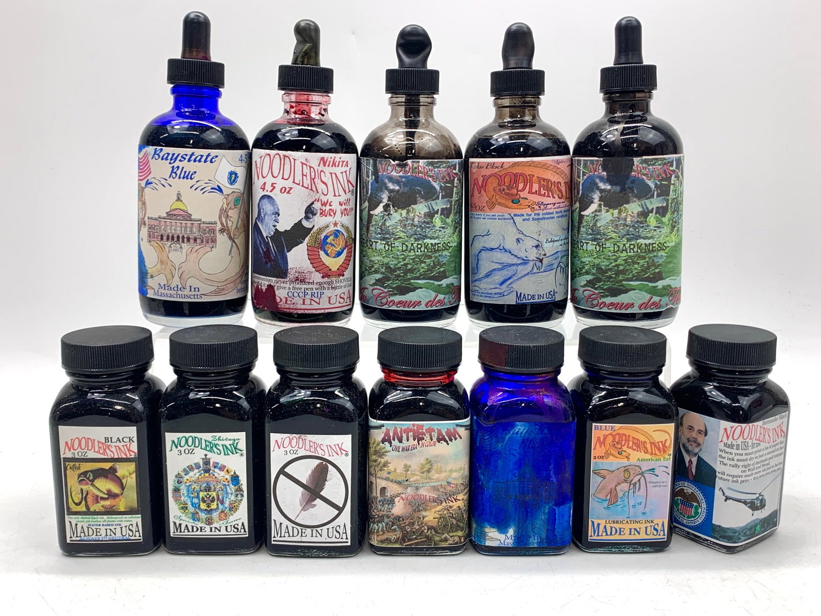 Noodlers Ink Blue, CCCP, Heart of Darkness, Polar Black, Zhivago, X Feather, Antietam, Eel Blue ETC: Most opened but have majority of ink remaining. 4.5oz & 3oz sizes. Shipping: We do not provide in-house shipping or packing. Please reach out to one of our preferred shippers for a quote: Donald Camde