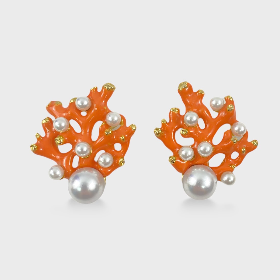 Kenneth Jay Lane Coral & Faux Black Pearl Clip On Earrings: Shipping: We do not provide in-house shipping or packing. Please reach out to one of our preferred shippers for a quote: Donald Camden UPS Store #4608 store4608@theupsstore.com - 703-569-8802 Navis Pa