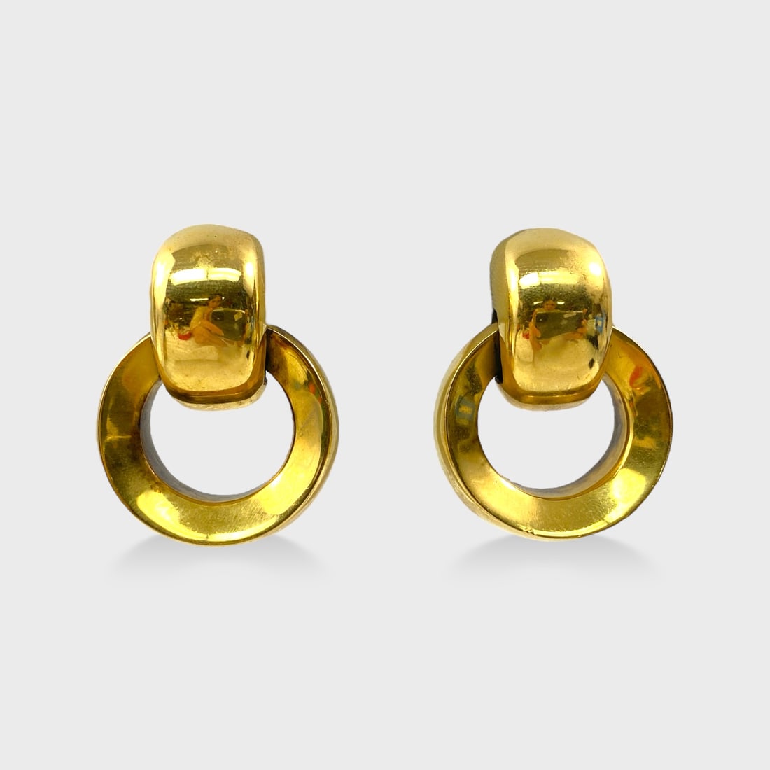 VOUBEL Classic Gold Tone Circle Clip-On Earrings: Approx. 1 5/8" x 1 1/8" Shipping: We do not provide in-house shipping or packing. Please reach out to one of our preferred shippers for a quote: Donald Camden UPS Store #4608 store4608@theupsstore.com