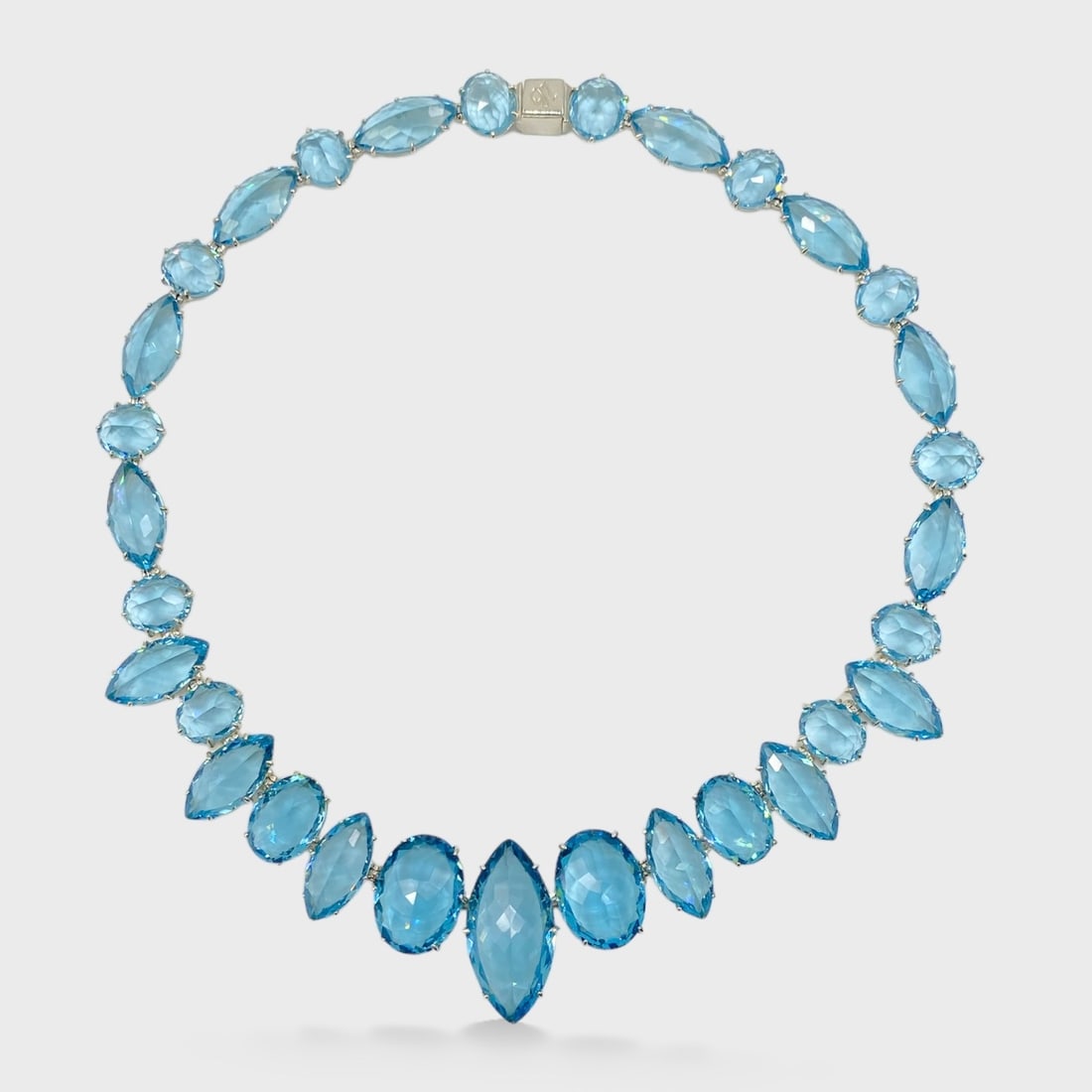 Silver Tone Prong Set Faceted Blue Topaz Necklace: Shipping: We do not provide in-house shipping or packing. Please reach out to one of our preferred shippers for a quote: Donald Camden UPS Store #4608 store4608@theupsstore.com - 703-569-8802 Navis Pa