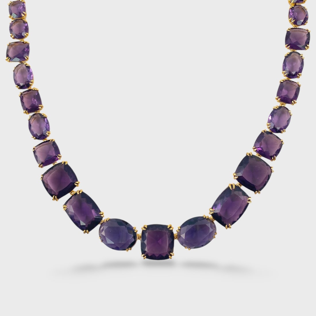 Gold Tone Prong Set Faceted Amethyst Costume Necklace: Largest stone approx. 15mm. Shipping: We do not provide in-house shipping or packing. Please reach out to one of our preferred shippers for a quote: Donald Camden UPS Store #4608 store4608@theupsstore