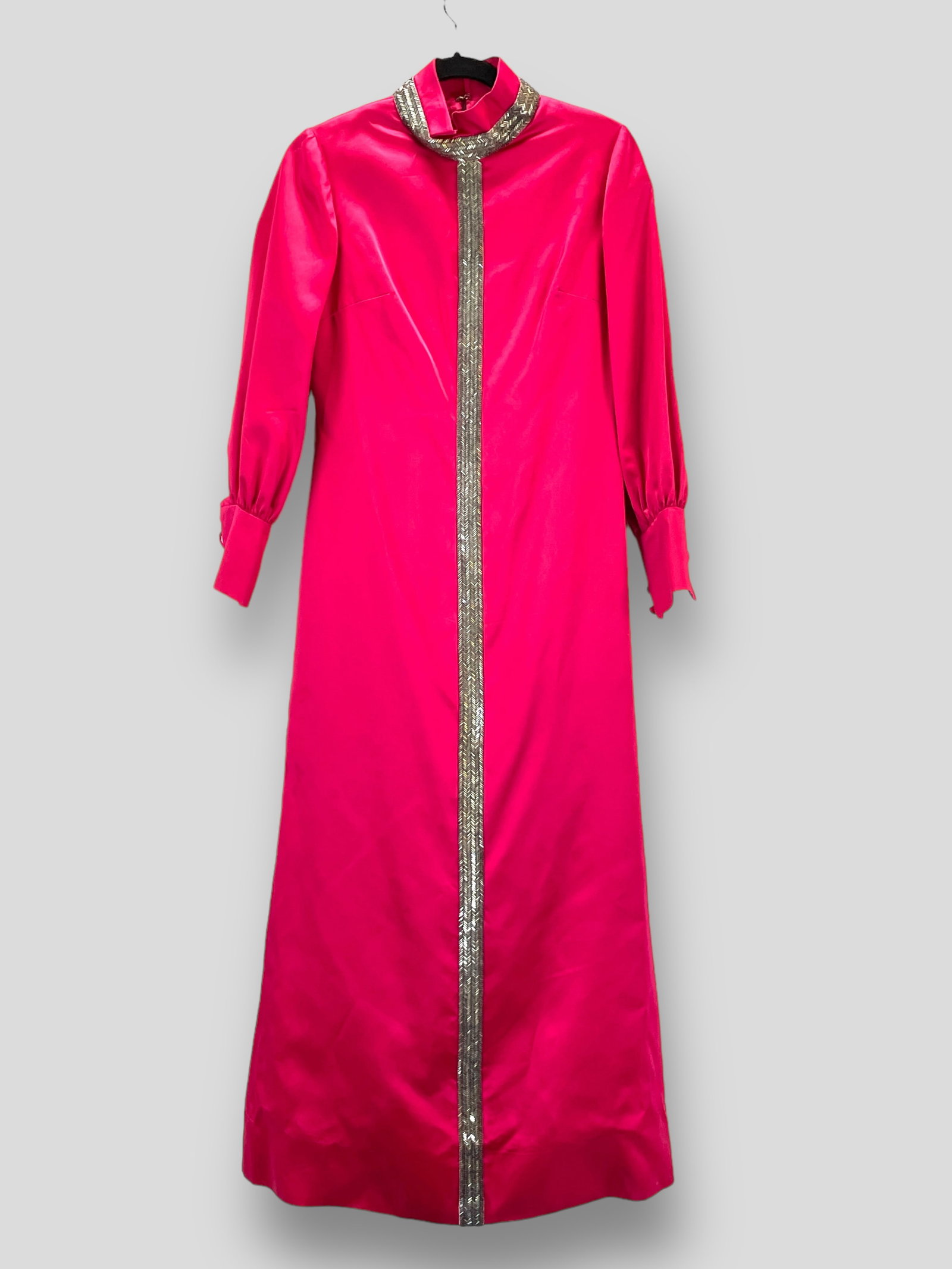 Vintage Long Sleeve Pink Satin Gown with Silver Chevron Beading.: Measurement taken flat. Shoulders 20" Chest 13" Length 52" Shipping: We do not provide in-house shipping or packing. Please reach out to one of our preferred shippers for a quote: Donald Camden UPS St
