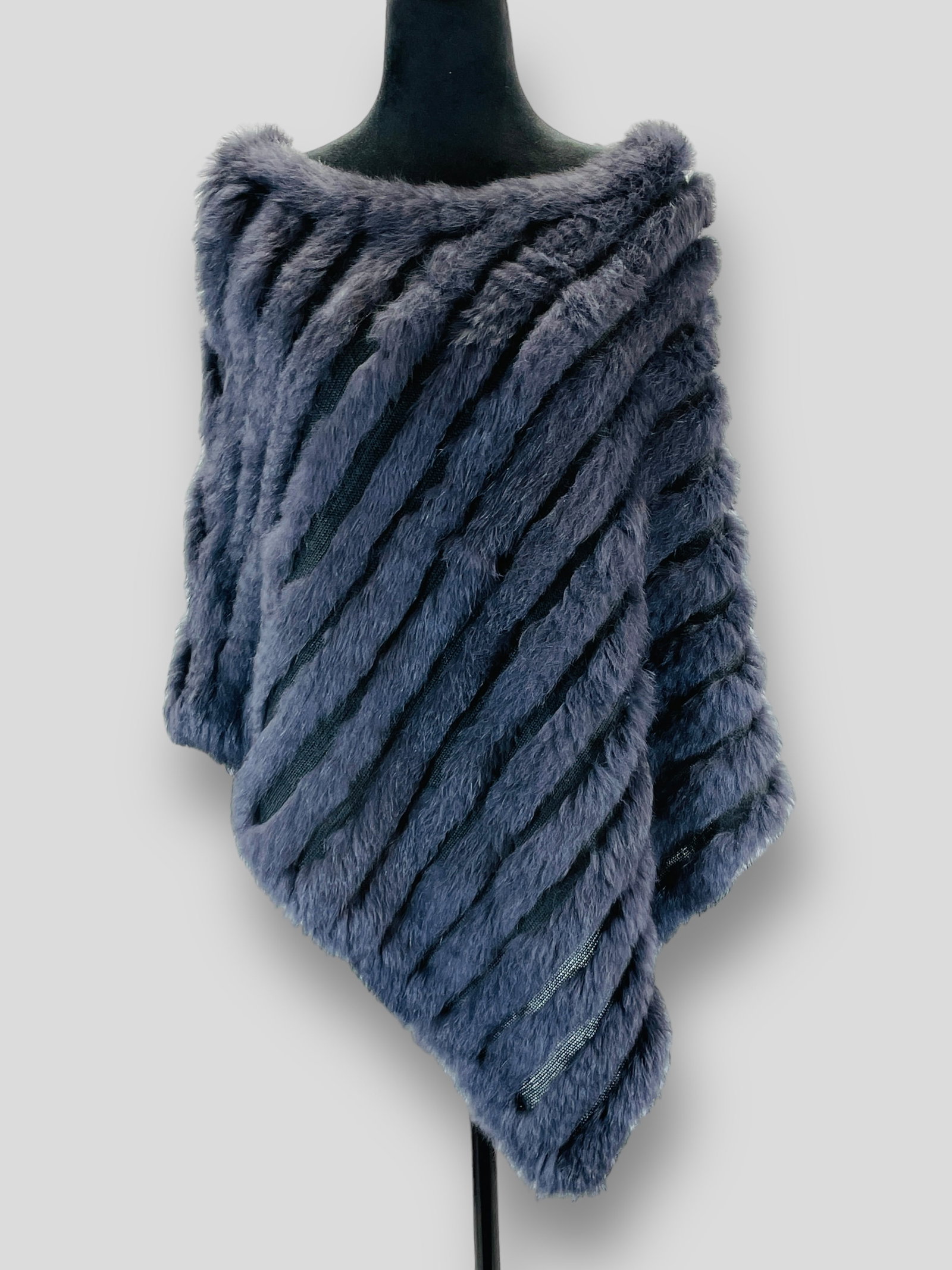 STEFANEL Genuine Rabbit Fur Assymetrical Steel Blue Cape.: Measurements taken flat. Shoulders 21" Chest 15" Shipping: We do not provide in-house shipping or packing. Please reach out to one of our preferred shippers for a quote: Donald Camden UPS Store #4608 
