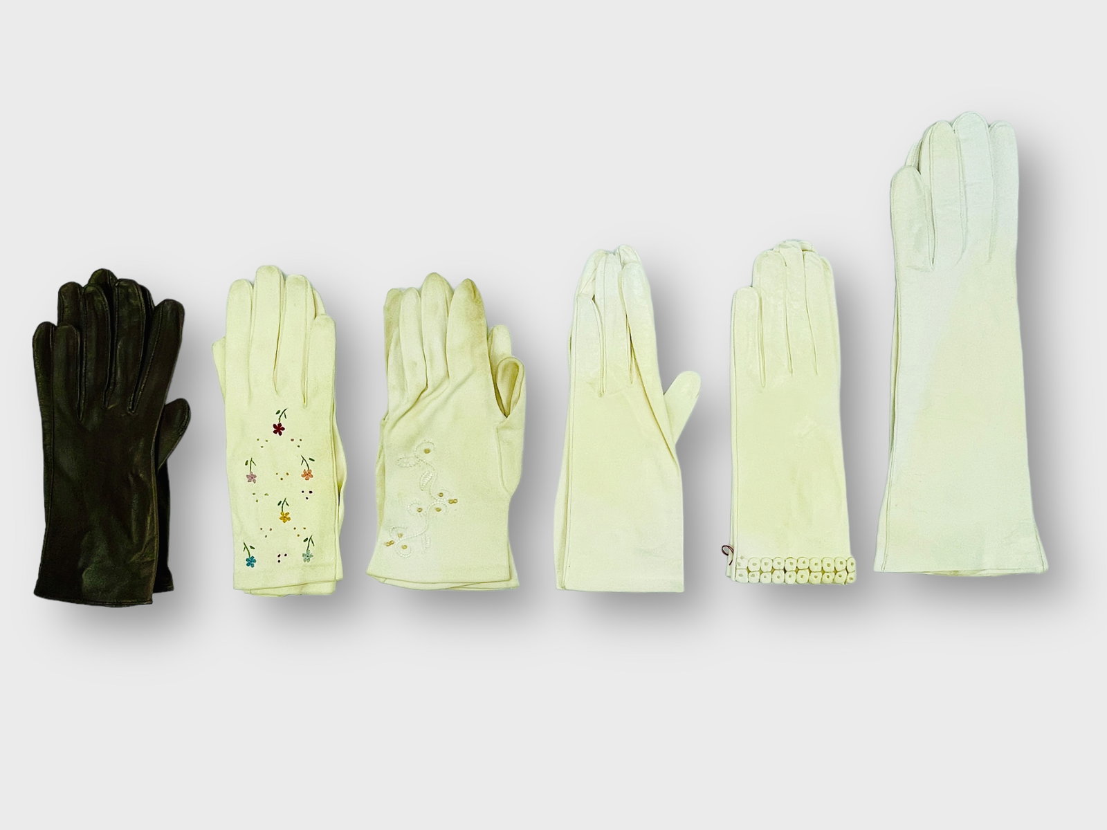 Vintage Ladies Gloves, 6 Pairs: Presents some stains. Shipping: We do not provide in-house shipping or packing. Please reach out to one of our preferred shippers for a quote: Donald Camden UPS Store #4608 store4608@theupsstore.com -