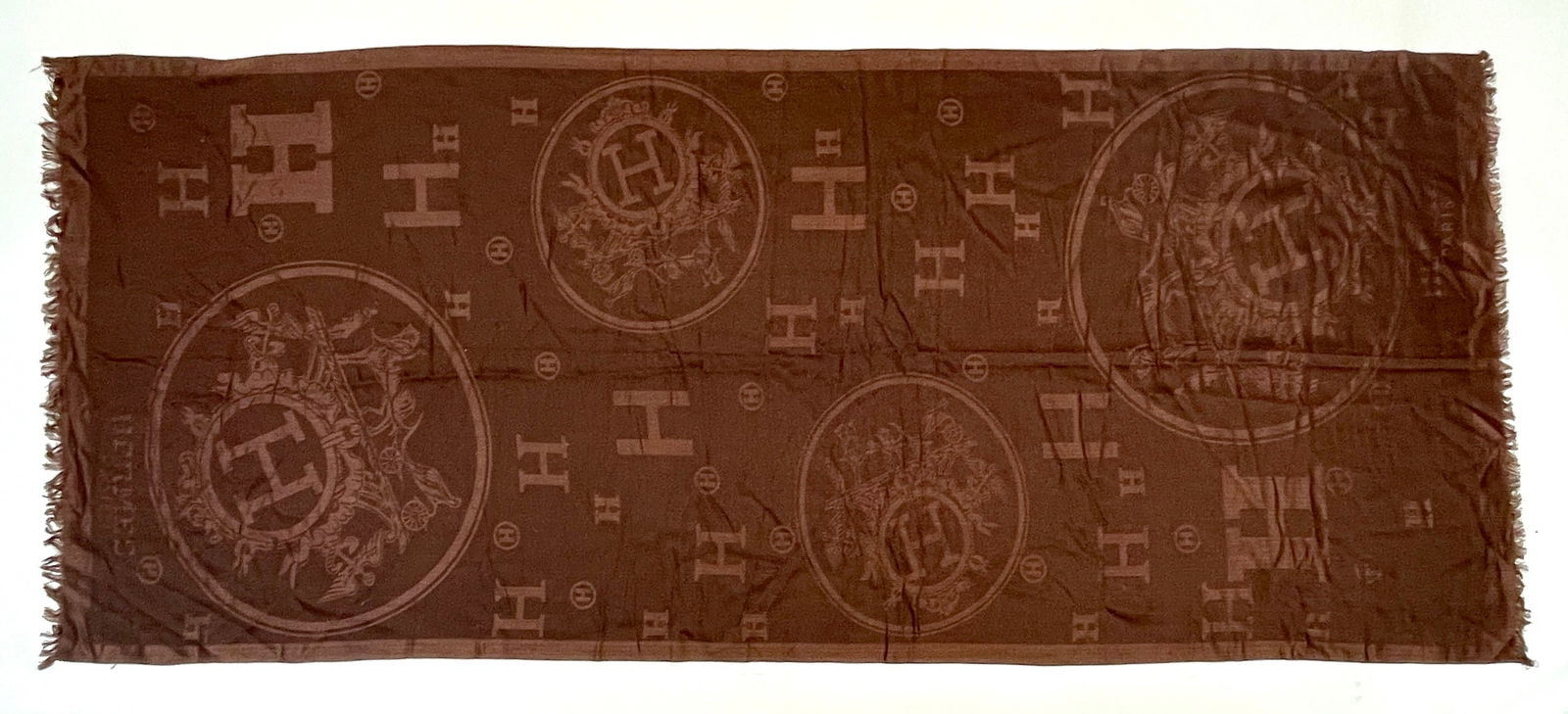 HERMES RICN Brown Libris Stole Wool with Iconic "H" Pattern: Shipping: We do not provide in-house shipping or packing. Please reach out to one of our preferred shippers for a quote: Donald Camden UPS Store #4608 store4608@theupsstore.com - 703-569-8802 Navis Pa