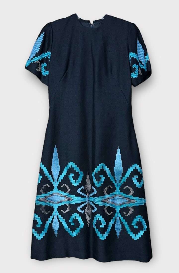YOANTA XEIPONOIHTA TEXTILES Black Wool and Cotton Short Sleeve Midi Dress with Bright Blue Tribal: Great Condition. Measurement Taken Flat. Shoulders 15 in. Chest 19 in. Length 44