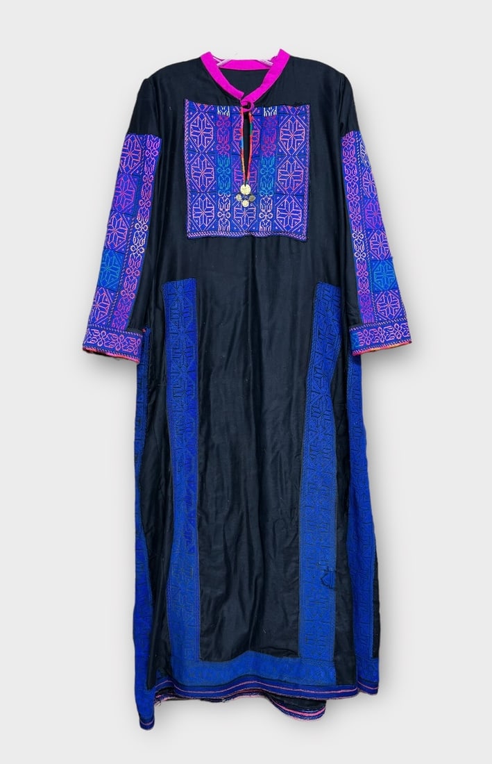 Tribal Black and Blue Caftan with Hot Pink Collar and Muli Color Woven Panels on Bib and Sleeves. No: Wear on Hemline and visible mends. Measurement taken flat. Shoulders 15 in. Chest 22 in. Length 55 in.