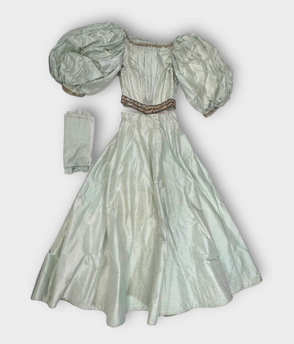 Antique Victorian Seafoam Green Silk Puff Sleeve Top and Skirt: Fabric on Top is dry-rotted and torn. Spot on skirt. shoulder 14 in. chest 14 in. Waist 10 in. Shipping: We do not provide in-house shipping or packing. Please reach out to one of our preferred shippe
