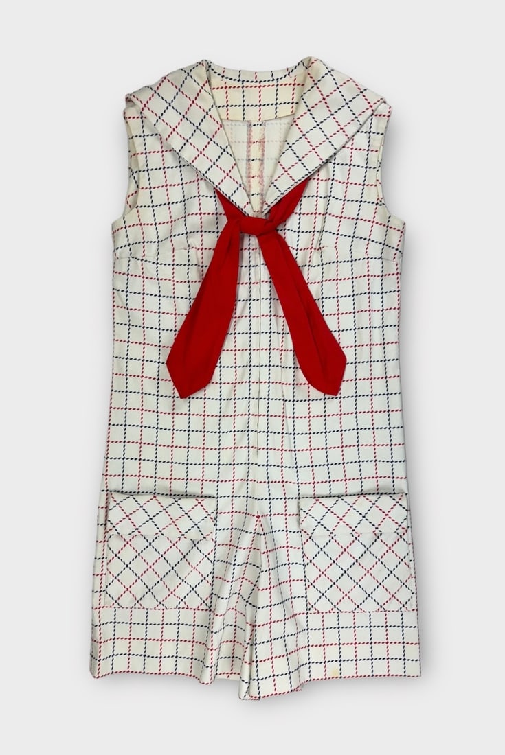 Vintage Handmade Cotton Canvas Sailor Style Romper. White with Red and Blue Plaid Pattern and Red: Presenting some yellowing to fabric and spot on left hemline. Otherwise, Good Condition. Measurement taken flat. Chest 18 in. Waist 17.5 in. Length 36 in.