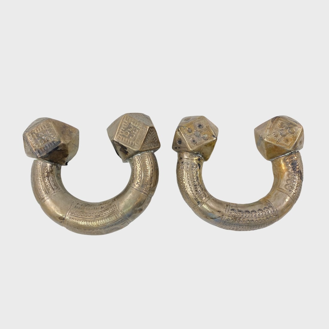 Pair Hollow Silver African Tribal Currency Bracelets: Total weight approx. 282 grams. Inside measures approx. 3”. Approx. 1 1/8” wide. Ends approx. 1 1/2” wide. See photos for condition.