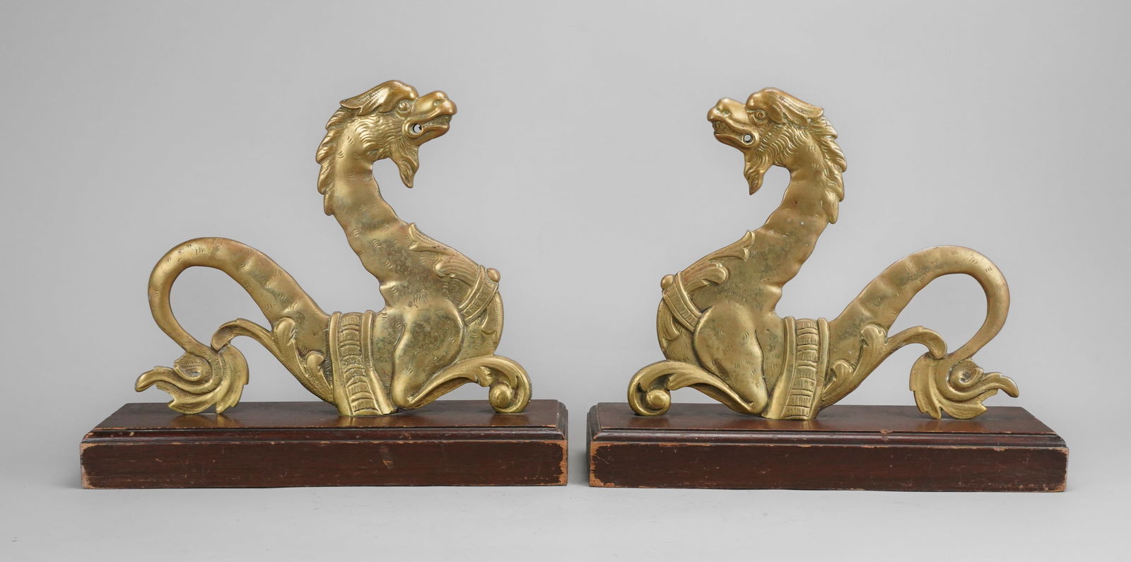 Antique Mirrored Pair Brass Full-Body Dragon Fireplace Ends: Very good original condition with no bends, breaks, cracks or repairs. Looks as though they held rings in their mouth. Although these appear to be fireplace items, we see no evidence of that. Includin
