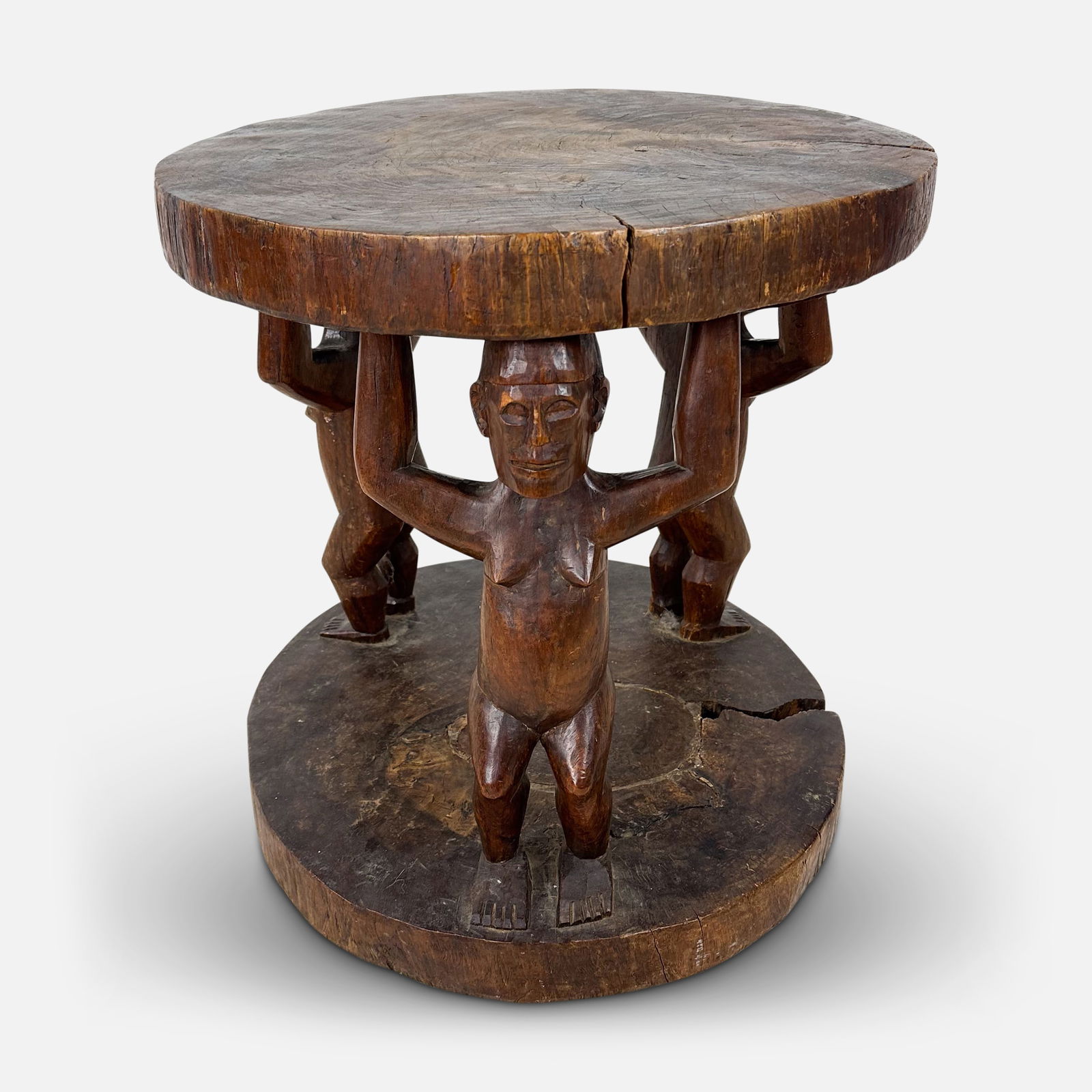 African Ifugao Style Carved Wood Nude Men Drum Stool: Good overall condition, with age-cracks, repair, age-appropriate wear. We Do Not Provide In-House Shipping!Please reach out to one of our preferred shippers listed below. Donald Camden UPS #4608 - sto