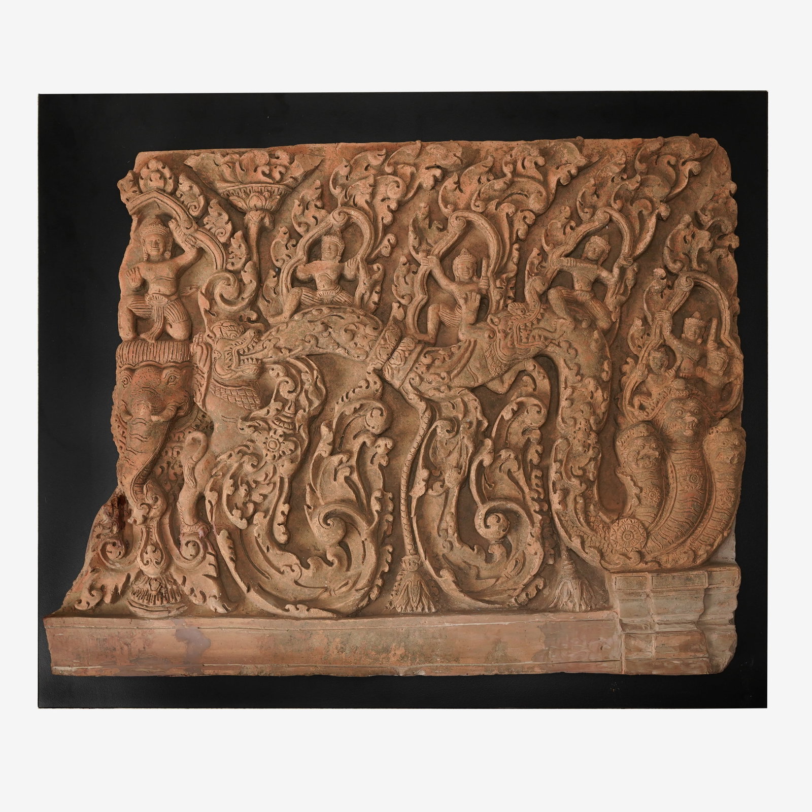 Antique Thai/Cambodian Khmer Style Carved Lintel Terra Cotta Frieze on Black Museum Plinth Mount #1: First of three antique terra cotta friezes mounted on plinths. We Do Not Provide In-House Shipping! Please reach out to one of our preferred shippers listed below. Donald Camden UPS #4608 - store4608@