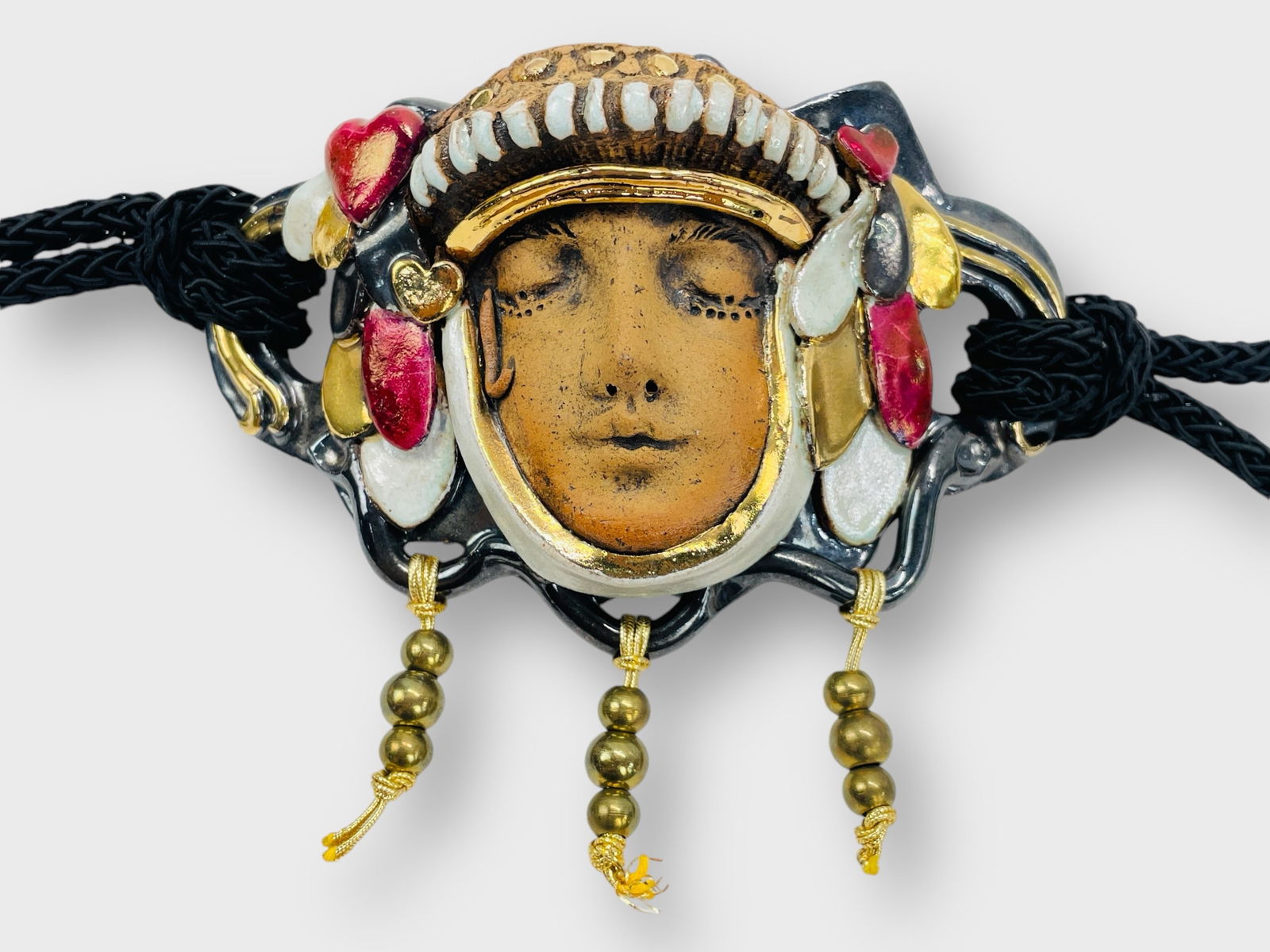 ART POTTERY POLYCHROME PAINTED FACE Vintage Silk Cord Belt with Figural Face Centerpiece Drop: Measurements of centerpiece. Approx. 5" x 3 1/4". Preowned, sold as is