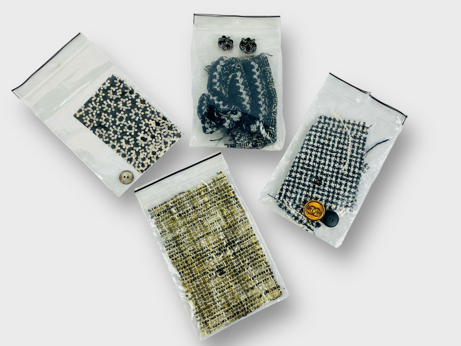 CHANEL Fabric Repair Kits with Swatches and Buttons. Lot of 4 Tweed and Floral Fabric.: Preowned, sold as is.