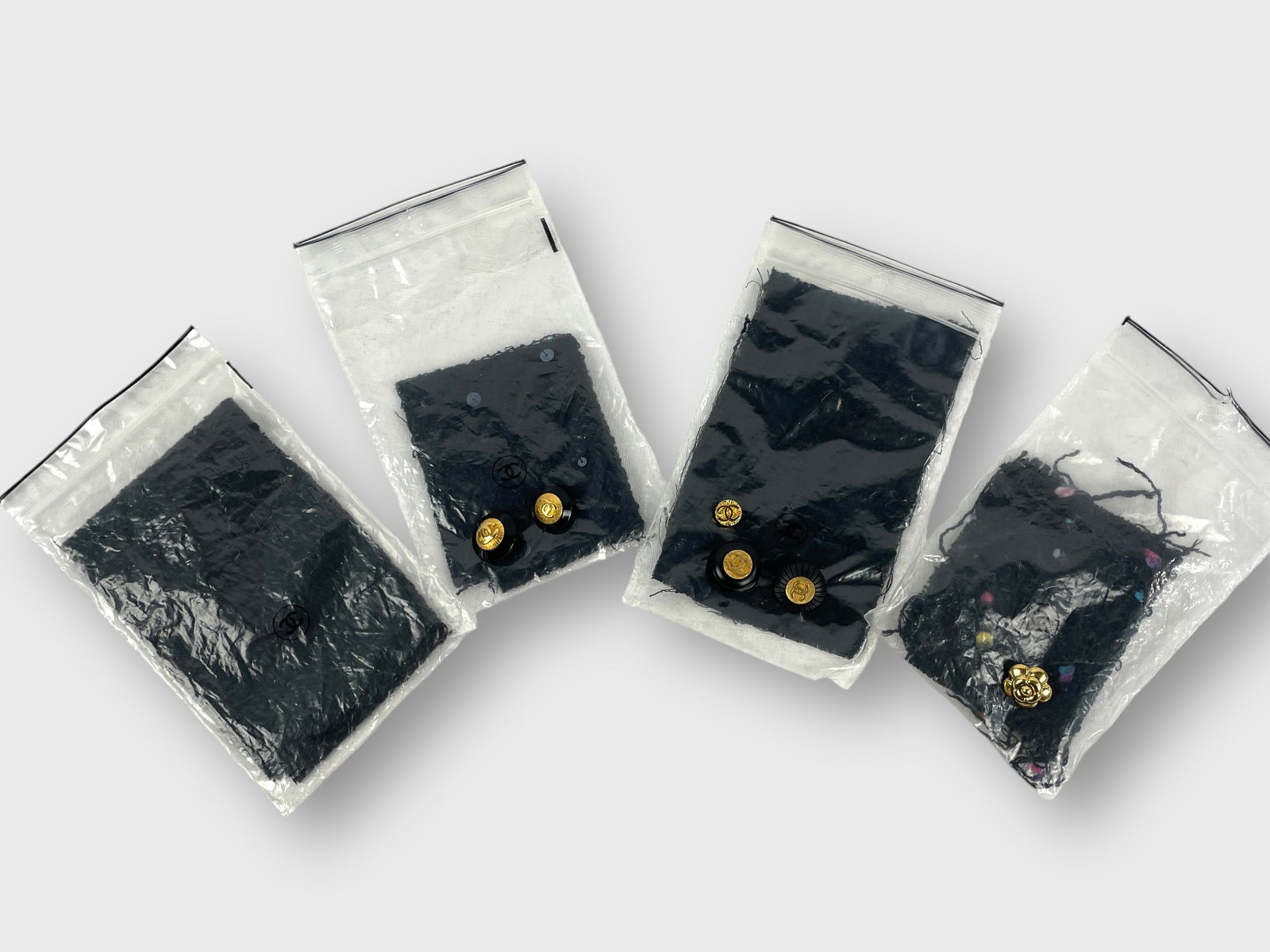 CHANEL Fabric Repair Kits with Swatches and Buttons. Lot of 4. Assorted Black Boucle Fabric.: Preowned, sold as is.