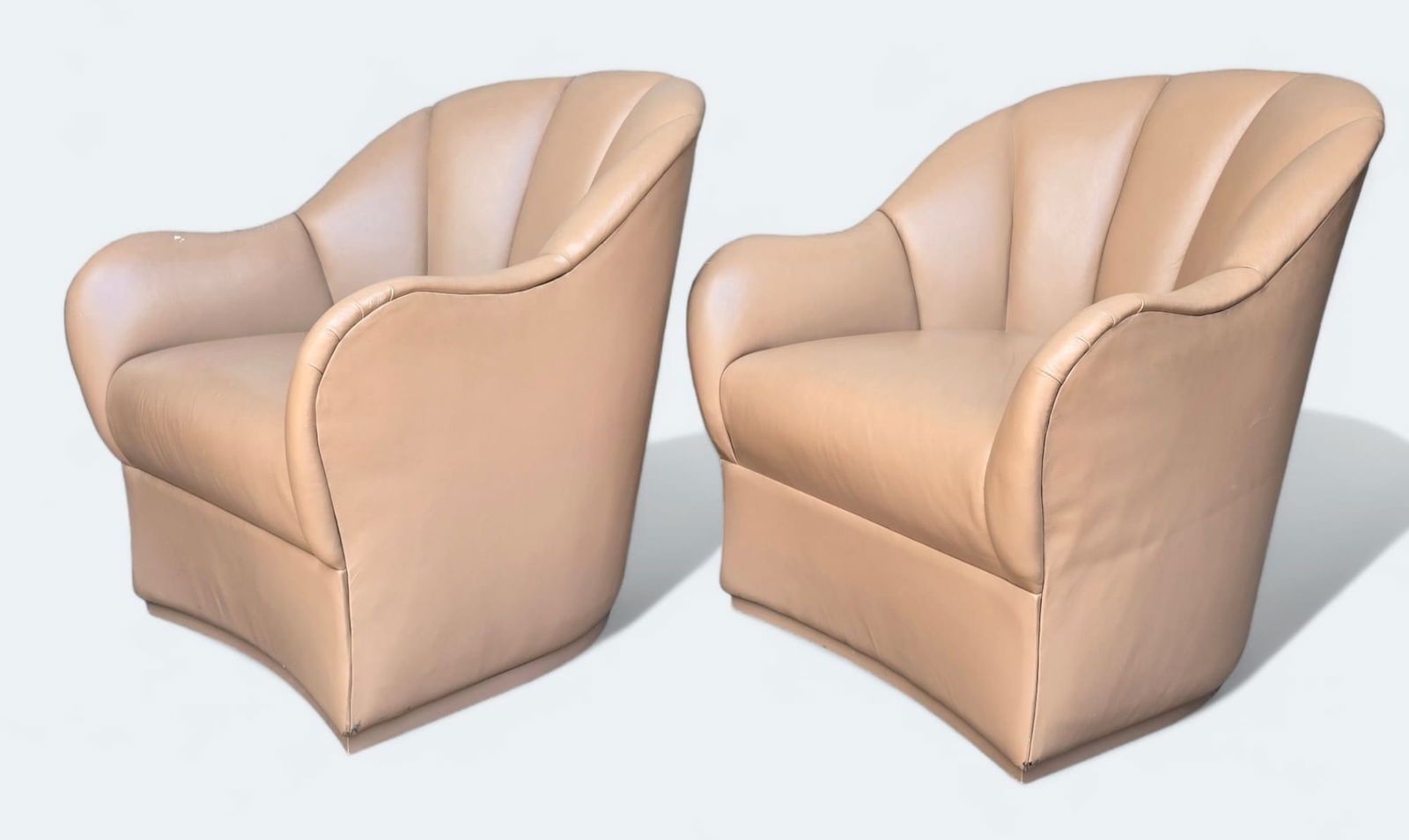 Pair Art Deco Leather Channel Back Lounge Chairs by Marco San Francisco: Ca. late 20thC. Very good overall except for a small area leather issue. Enlarge the pictures to see. These are sturdy, well built and perfect for a high traffic area. From the estate of Charles E Smi