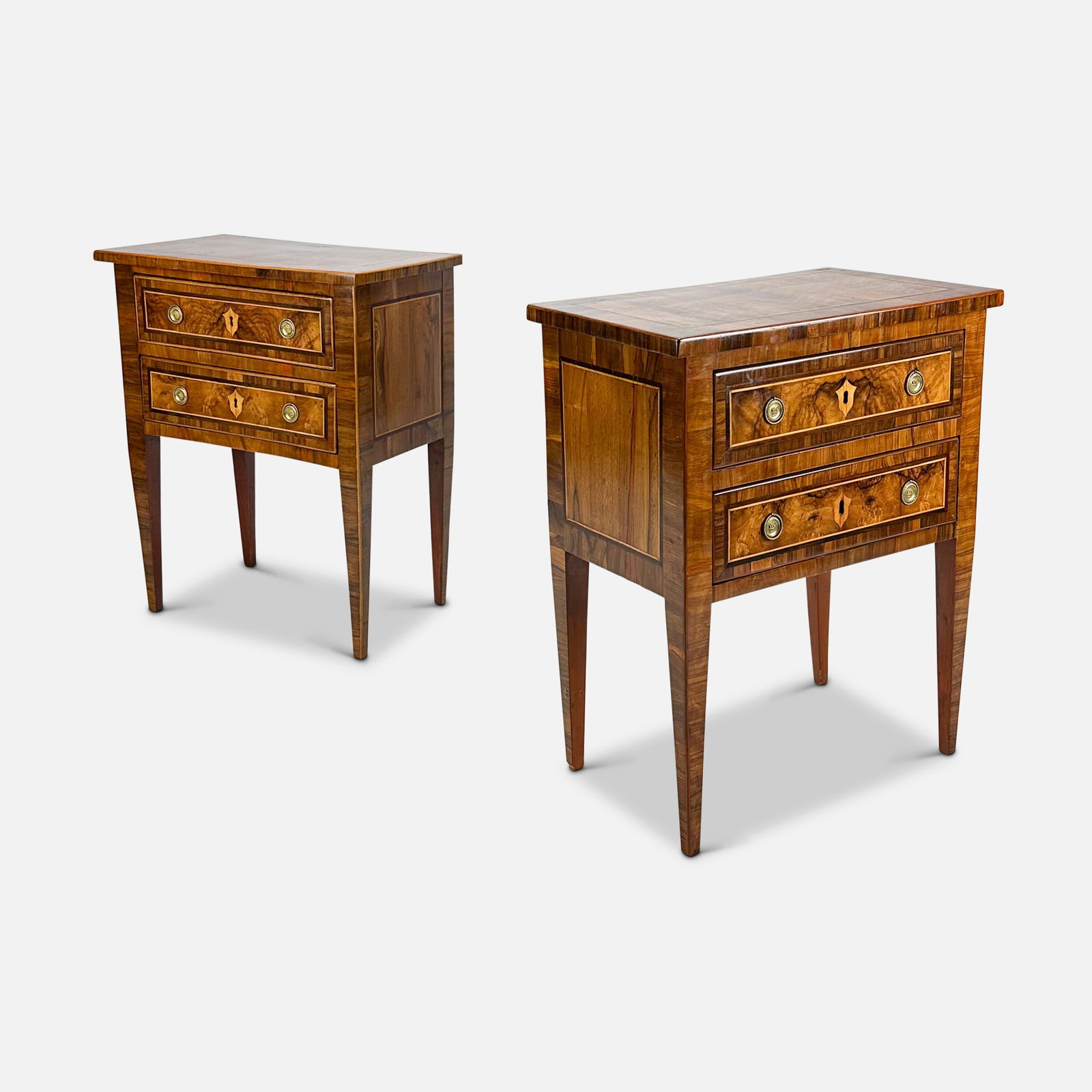 Pair Decorative Inlaid Wood Side Tables: Pair Guido Andreini & Co decorative inlaid wood side tables. One table is a bit higher than the other, measuring approx. 24 1/2" x 15" x 31 1/2". Other table measures 30 1/2" x 24 3/4" x 15". We do no