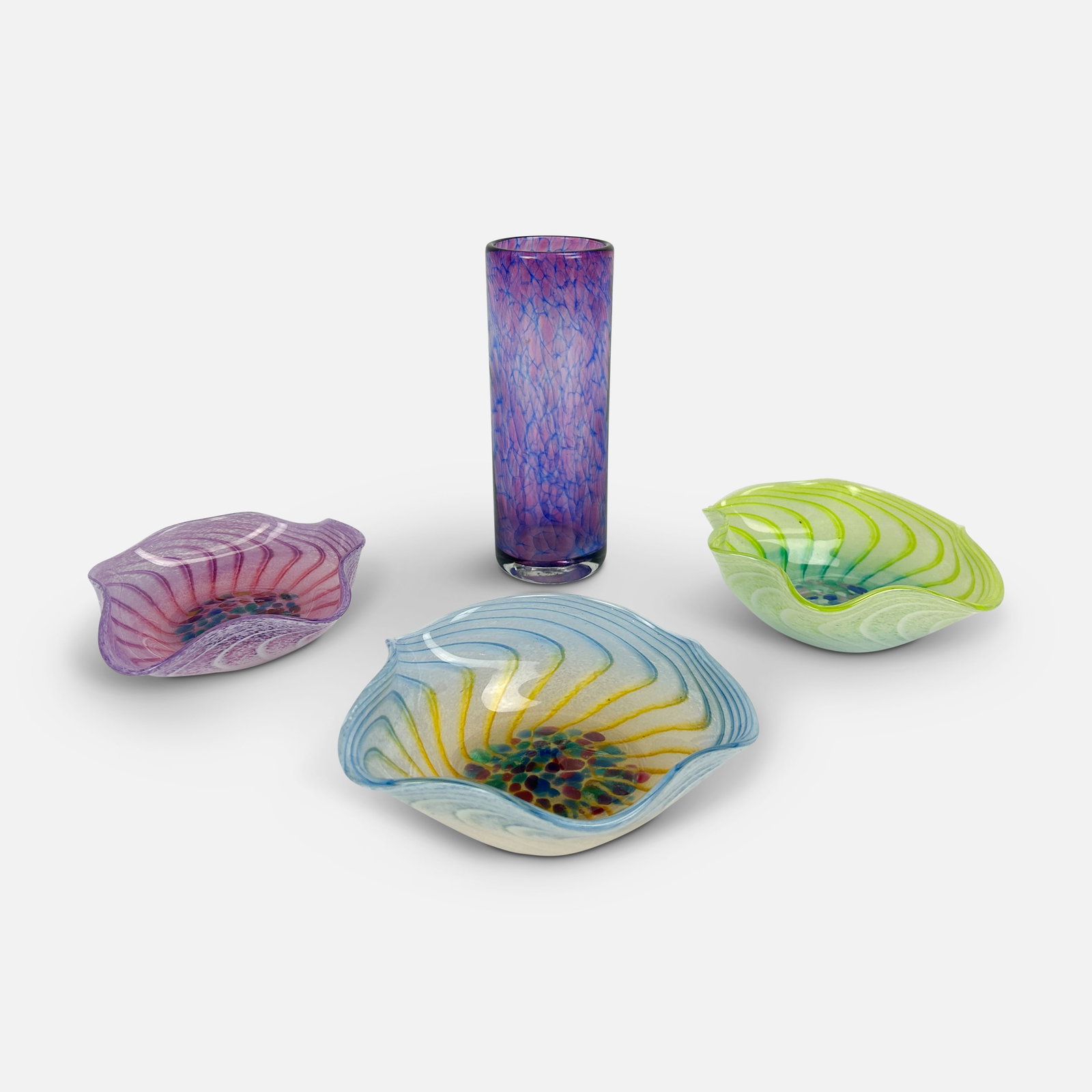 Four Italian Murano Art Glass Vases and Ruffled Bowls: Tallest vase measures 9" x 4 1/4". Straight vase measures 7" x 2 1/2". Blue ruffled bowl measures 2" x 6 1/4" x 6". None signed. We do not provide in-house shipping! Please reach out to Donald Camden 