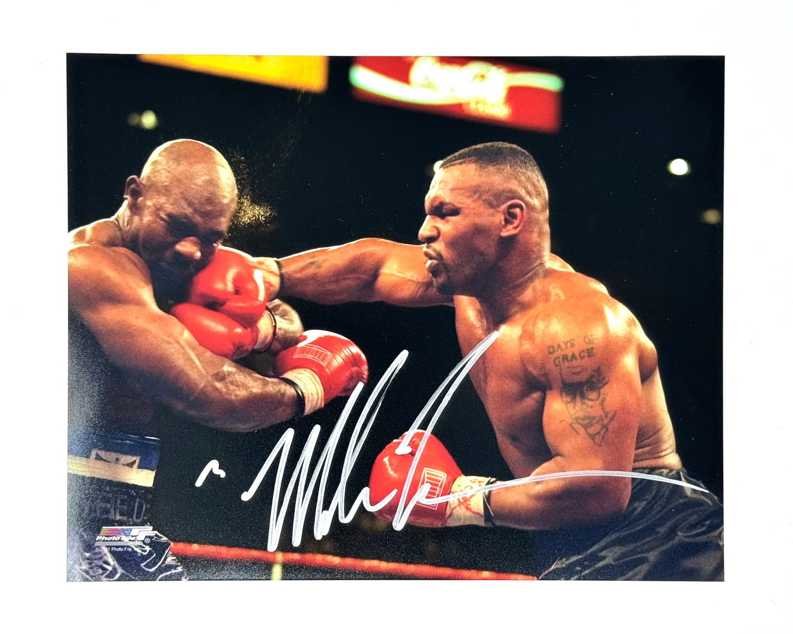 Mike Tyson Autographed Mike Tyson vs Evander Holyfield Photograph: Authenticated by CSA Shows, Chantilly, VA.. 8x10” photograph. SHIPPING & PICKUP: All shipping will be through UPS Store #4608, no exceptions. Please feel free to reach out before the auction end