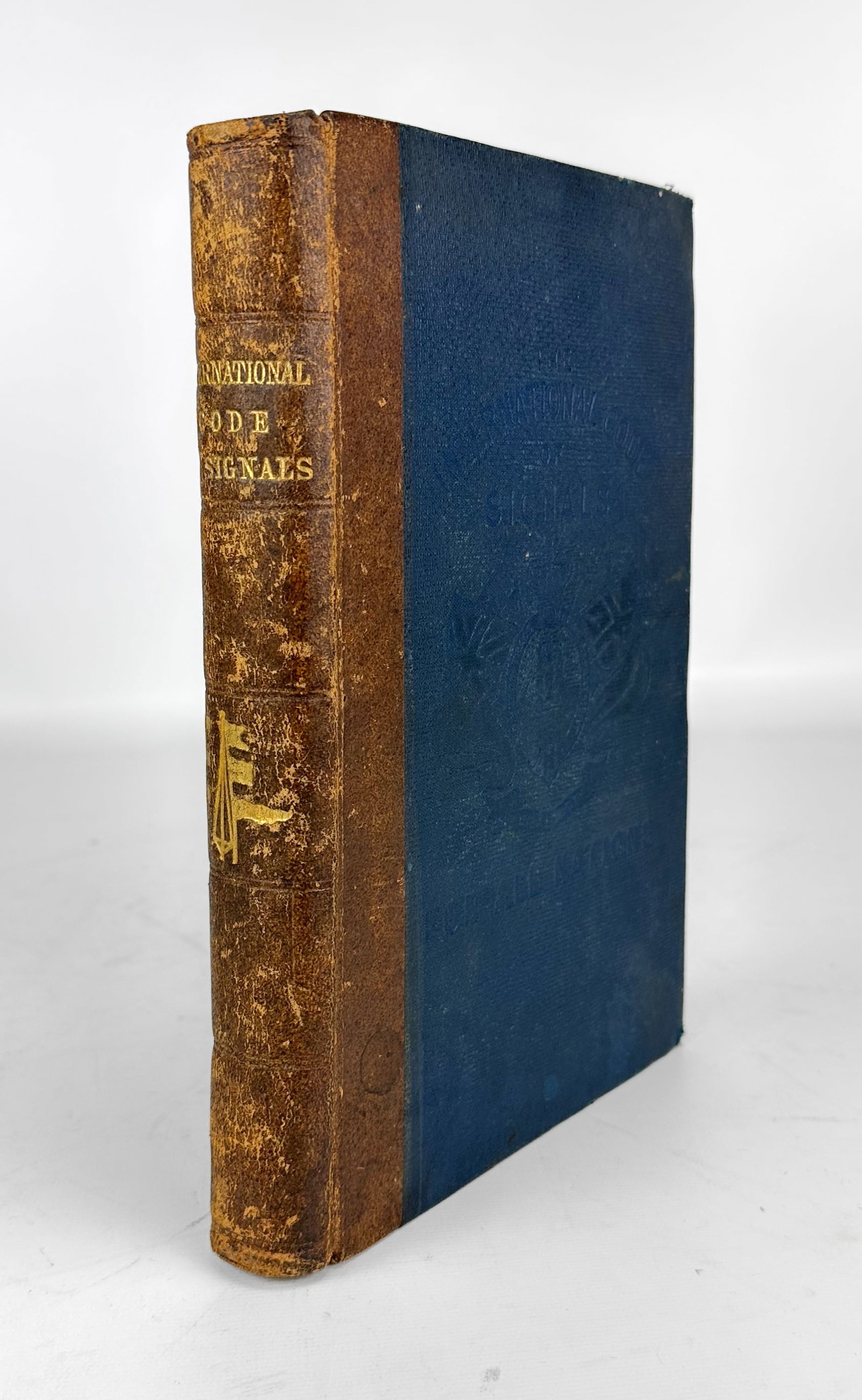 The International Code of Signals for all Nations 1874 Edition British Board of Trade: The International Code of Signals for all Nations 1874 Antique Book by the British Board of Trade. Fair overall condition, with shown foxing, surface wear to board, see photos for a better idea of spe