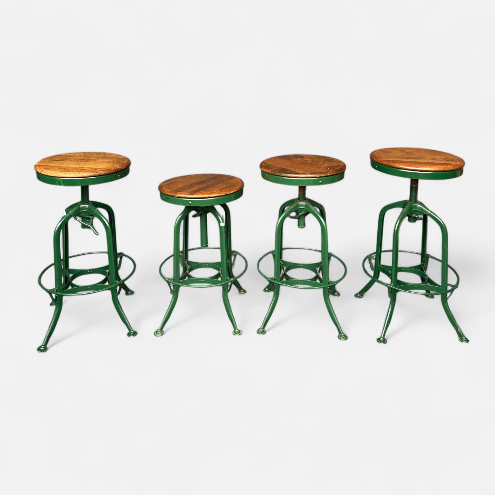 Four Original Toledo UHL Steel & Wood Adjustable Industrial Architect's Drafting Bar Stools