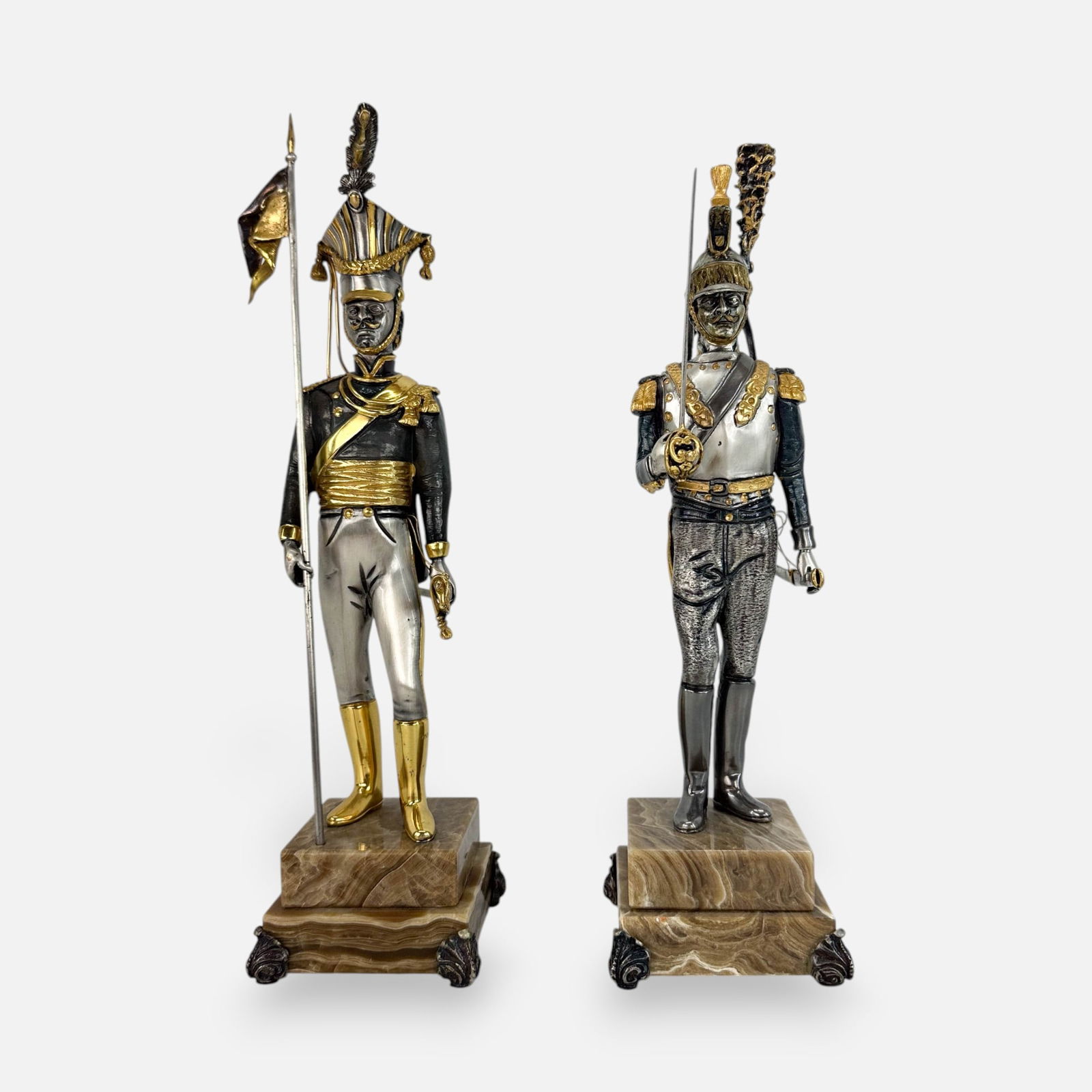 Two Giuseppe Vasari Bronze Military Soldiers Sculptures: Very good condition. Each sculpture numbered on base, see photos. Figure holding flag measurements included in listing. Simple integrated shipping with LiveAuctioneers LiveShipping is now available. B