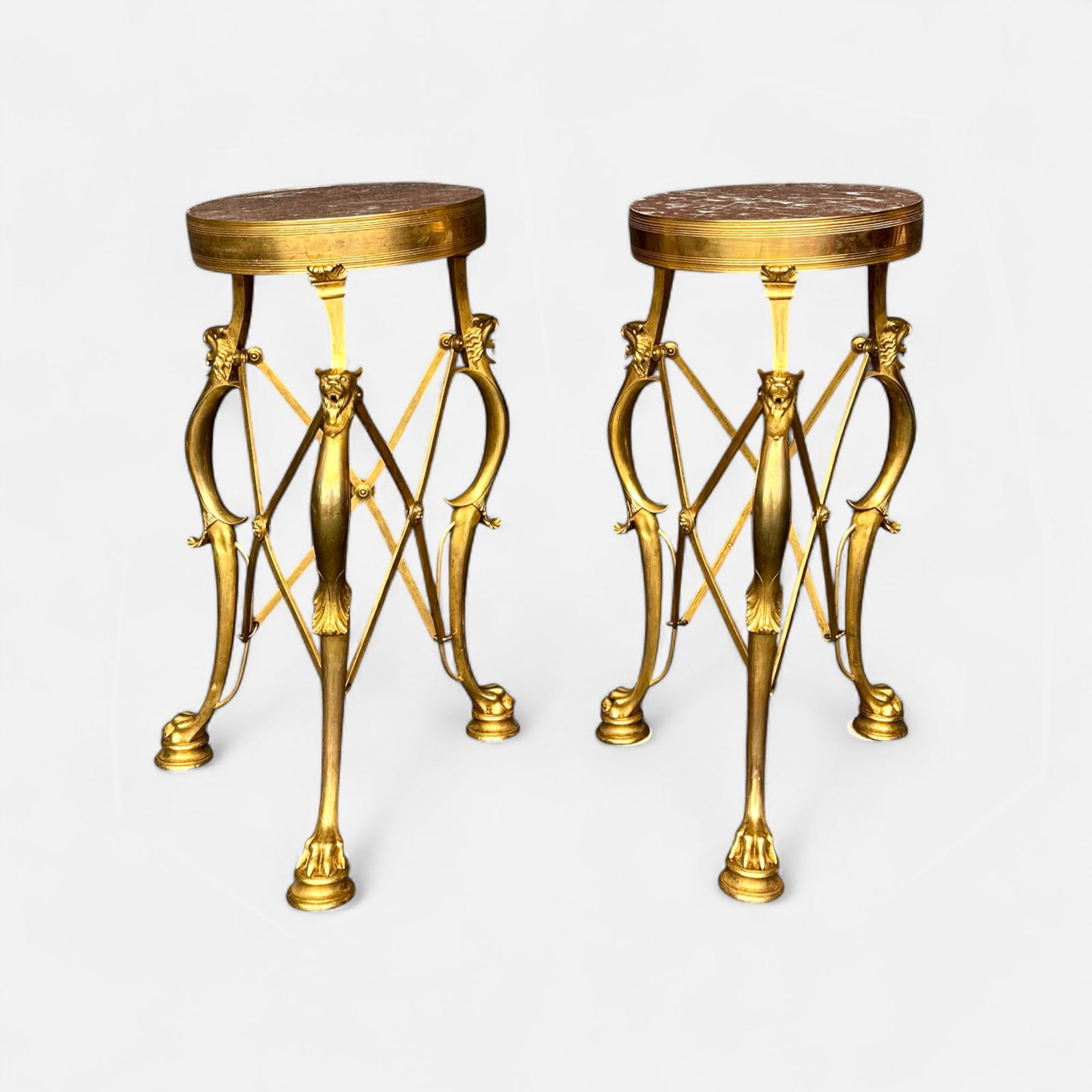 Pair Antique Bright Gilt Brass & Rouge Marble Gueridon Tables w/Lion Paw Feet & Head Decoration: Ca. first quarter 20thC. Both show significant bends as shown. Very good with minor age-appropriate surface wear/discoloration. Simple integrated shipping with LiveAuctioneers LiveShipping is now avai
