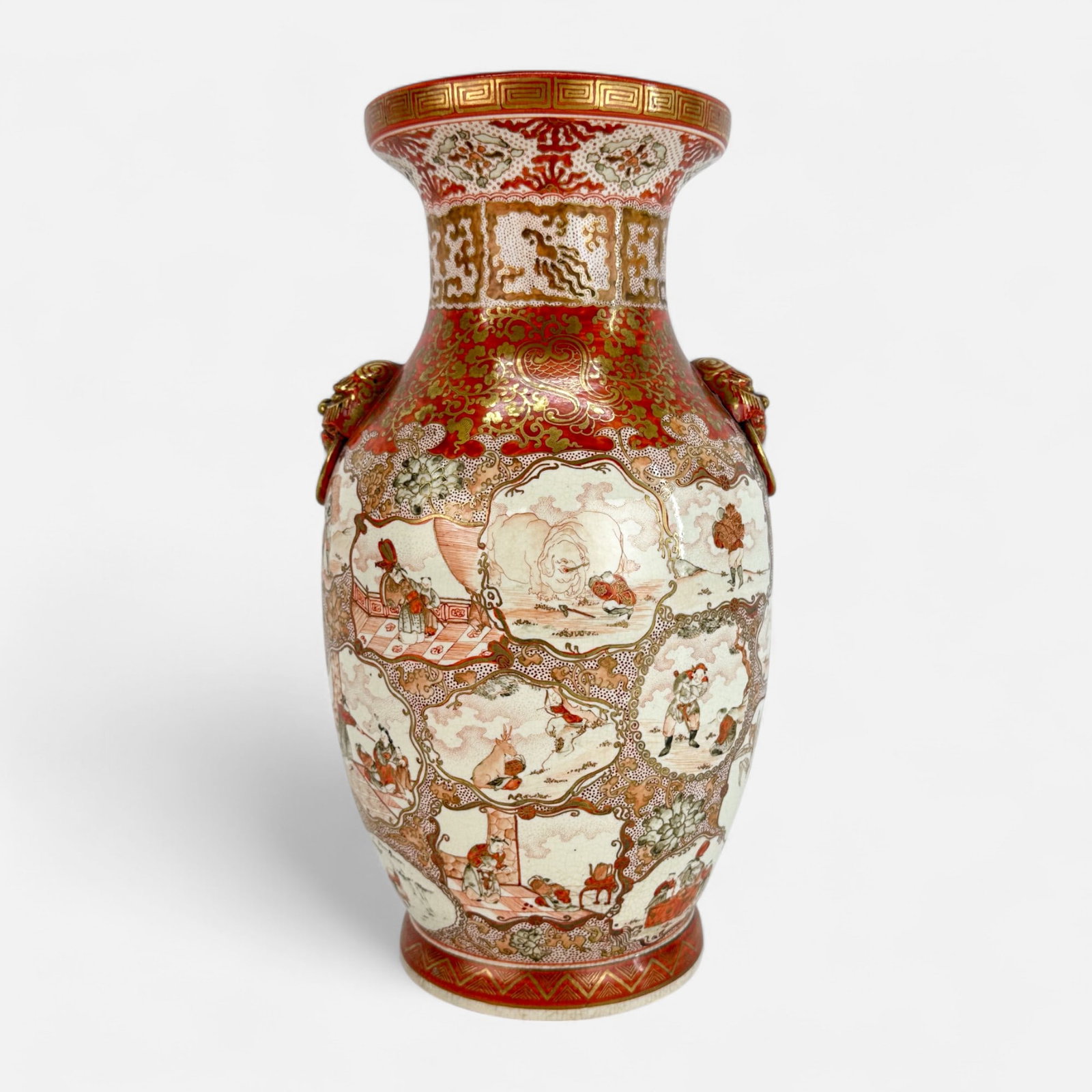 Antique 19thC Japanese Artist Signed Kutani Vase w/Lion Mask Handles: Very good with a few minor spots of paint loss, slight discoloration, tiny fleabites on rim. Overall crazing. Free of any chips, cracks, or repairs. Simple integrated shipping with LiveAuctioneers Liv