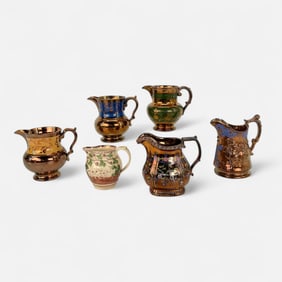 Six Antique Staffordshire Copper Luster Pitchers