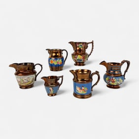 Six Antique Staffordshire Embossed Painted Copper Luster Pitchers
