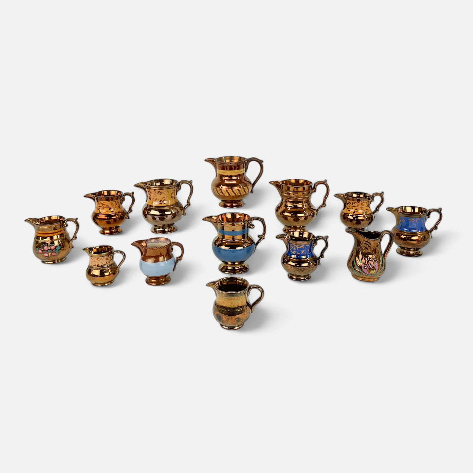 Thirteen Antique Staffordshire Copper Luster Pitchers (1 of 17)