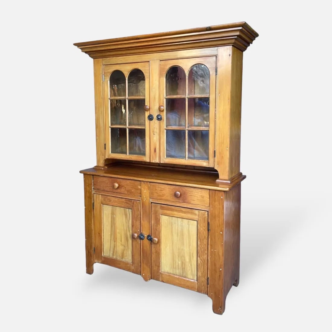Fantastic Antique 19thC Two Piece Twelve Light Step-Back Country Pine Cupboard: Ca. First half 19thC with iron hardware and wood knobs. Top features a wide cornice and blind bottom drawers. Original wavy glass and interior shelves. This piece features a very rich and warm patina 