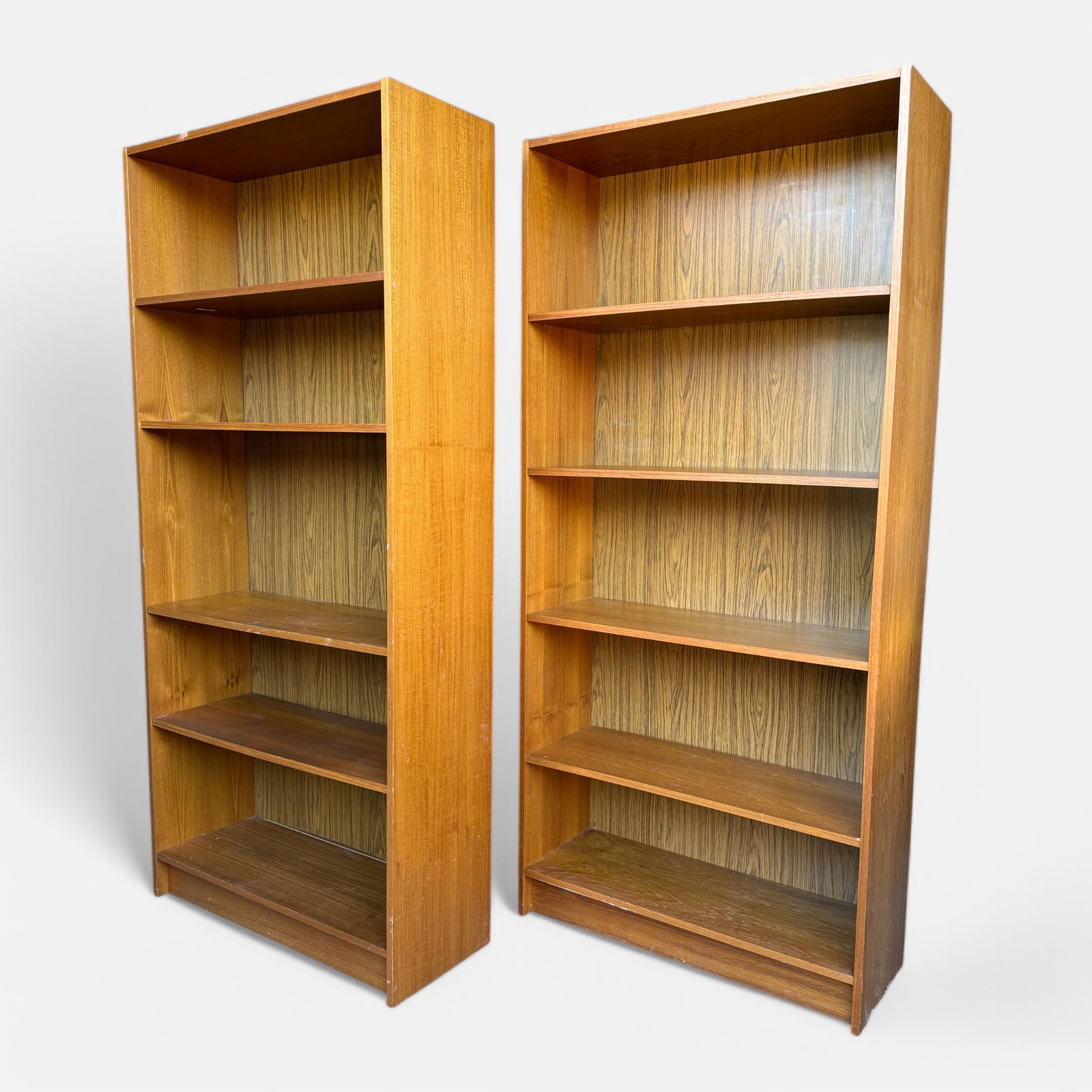 Pair Mid Century Danish Modern Teak Bookcases: Ca. last half 20thC. both in very good original condition. Marked as shown.