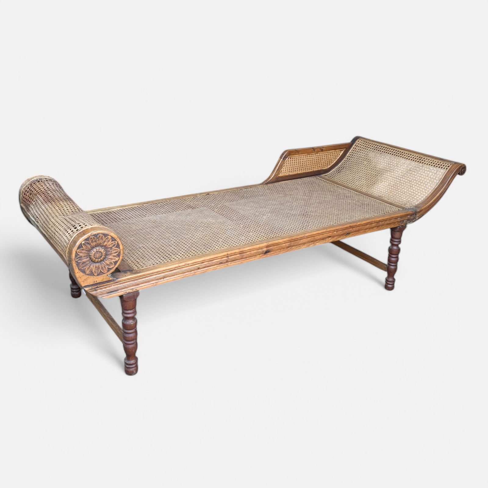 Antique 19thC English Colonial Carved Wood and Cane Daybed Sofa Recamier: Ca. second half 19thC. Natural pine wood surface. The caning on the headrest is loose and shows some collapse. Antique English Colonial Cane Daybed Sofa Recamier