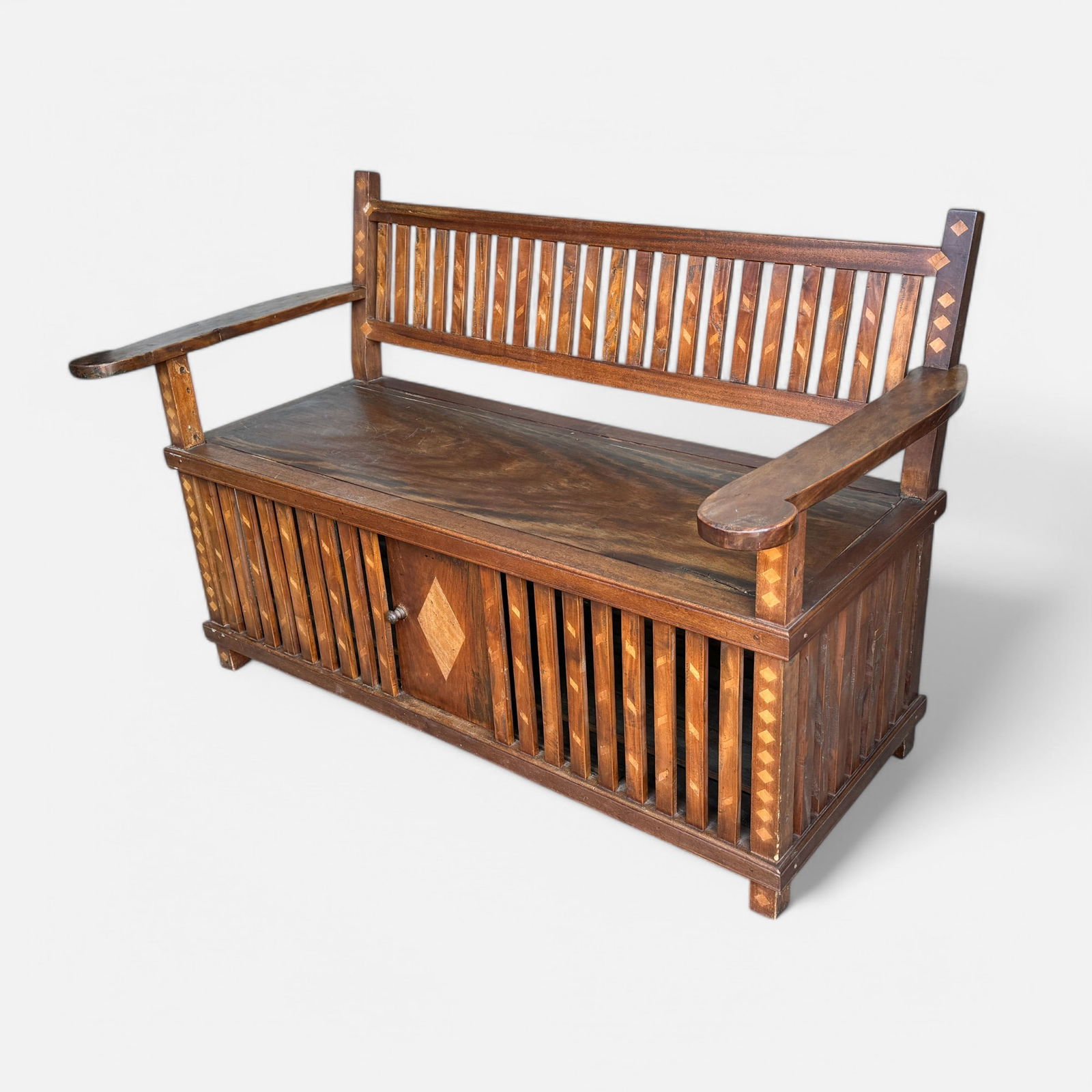 Antique Carved and Inlaid Wood Cage Bottom Storage Hall Seat Window Bench: Ca. first half 20thC. Very good with minor surface loss as shown. Carved and inlaid wood bench with sliding door opens to extra storage place, perhaps a coop for chickens? See damage to inlay.