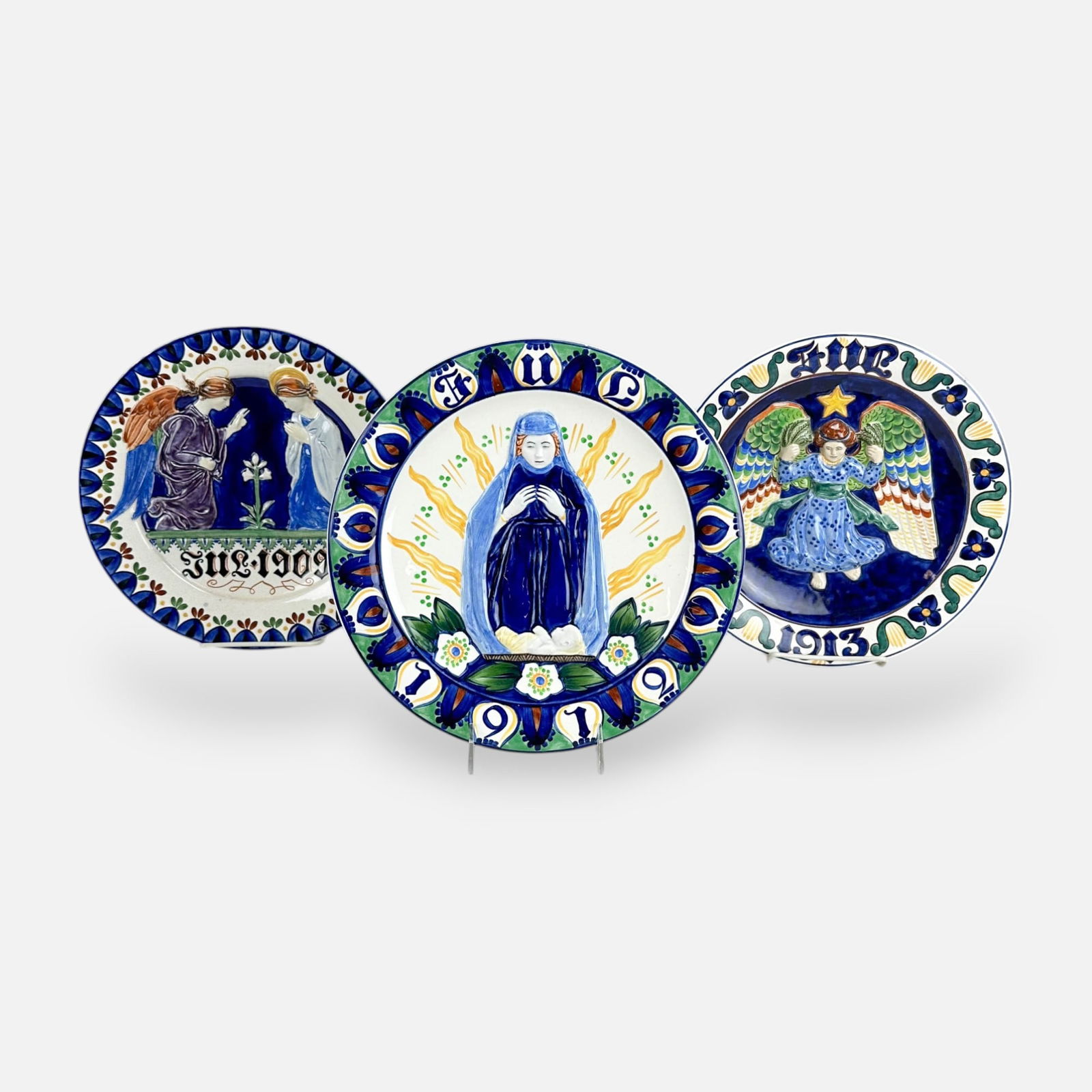 Three Royal Copenhagen Faience Porcelain Christmas Plates 1909, 1912, 1913: Very good, with only minor surface abrasions. Free from any chips, cracks, or repairs.