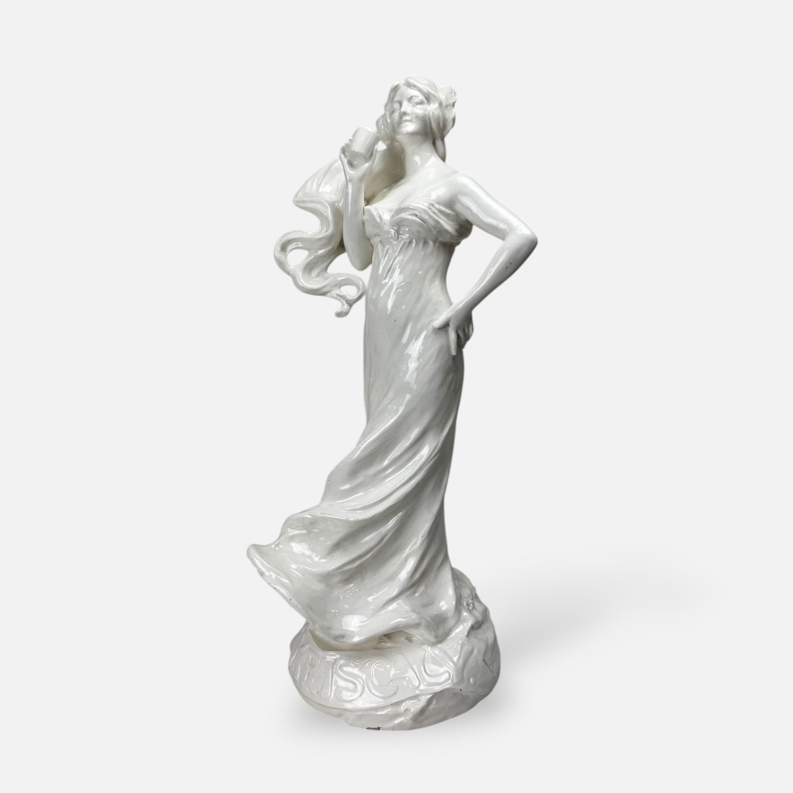 22" Tall Kriscaly Art Nouveau Ceramic Woman Advertising Statue White Figurine: Ca. first quarter 20thC. Very Good as shown with no chips, cracks, or repairs. Shows only minor surface glaze loss.