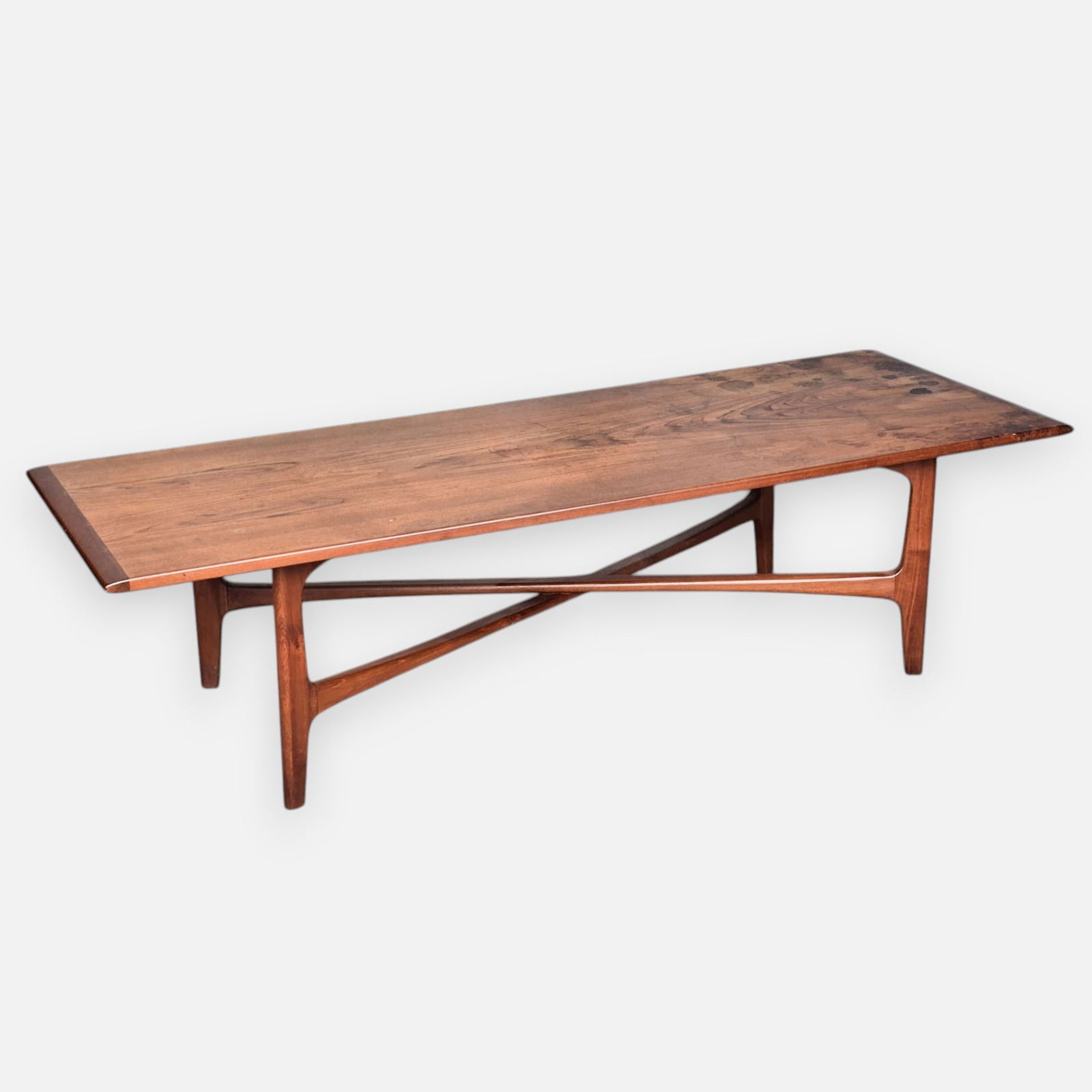 Folke Ohlsson Danish Modern MCM Teak X-Base Coffee Table: Attributed to Folke Ohlsson, apparently unmarked. Good as shown with surface water damage, age-appropriate minor surface scuffs/scratches. Minor separation to legs.