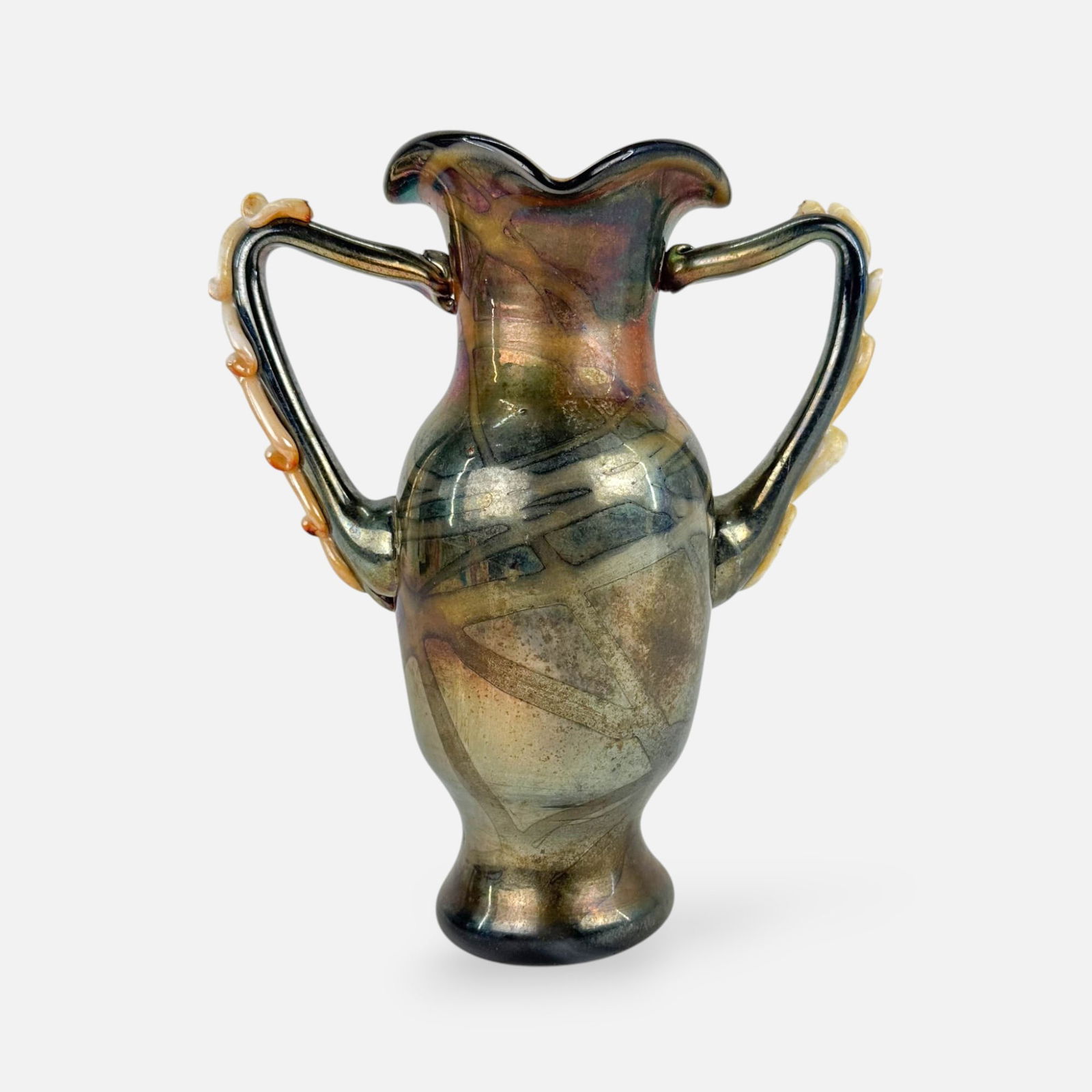 Art Nouveau Style Iridescent Art Glass Two-Handled Vase: Apparently unsigned. Good overall, with shown surface discoloration, needs cleaning. Possible breaks to end of white decoration on handles.