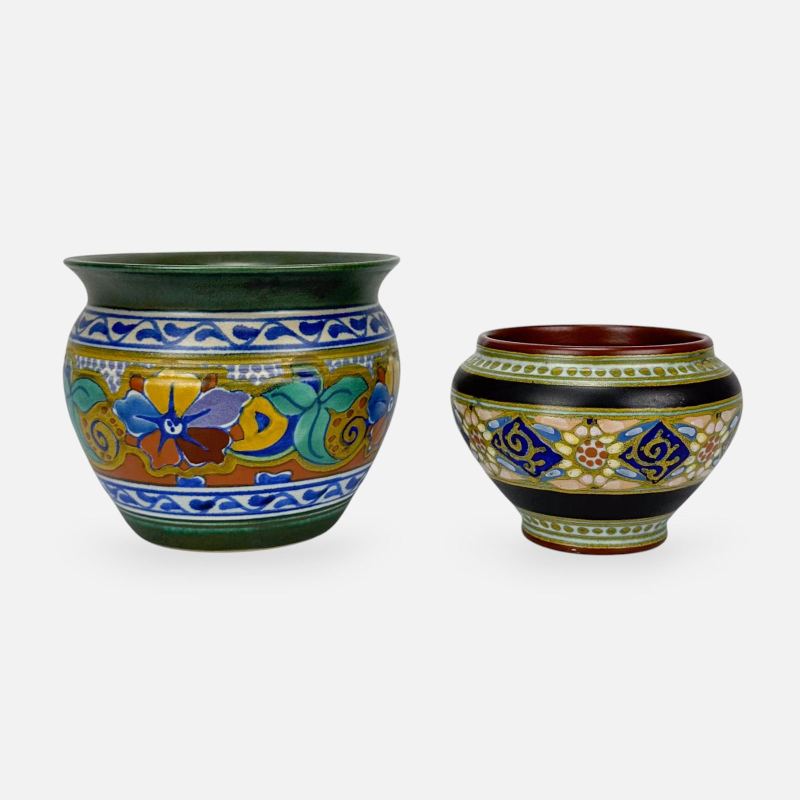Two Gouda Zuid-Holland Dutch Art Pottery Vases Bowls Jardinieres: Ca. early 20thC. Very good as shown, with minor paint loss. No chips, cracks, or repairs. Larger vase measurements included in listing. Smaller vase measures approx. 3 1/2" x 4 3/4".